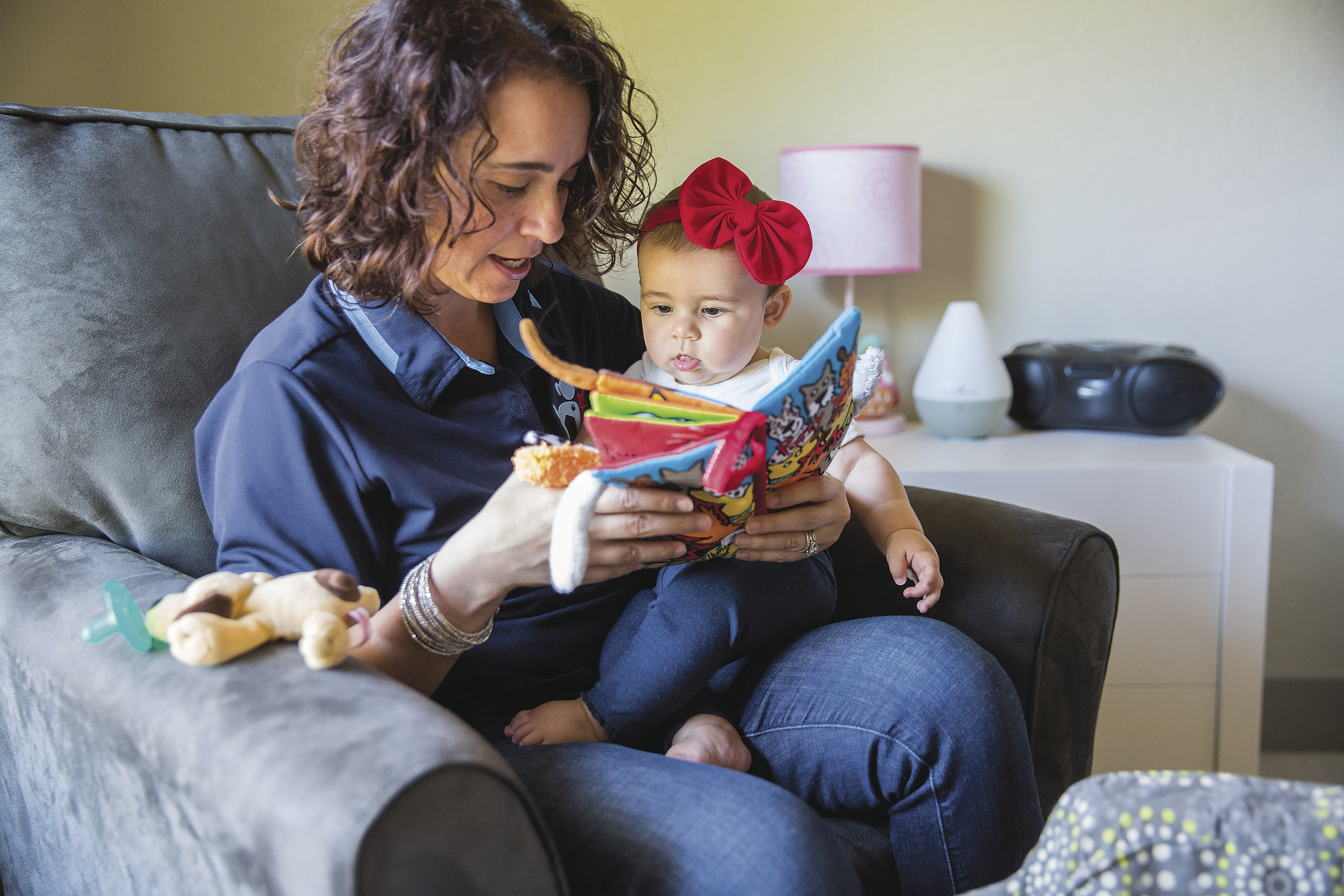 ON THE HOME FRONT: Angela Osborn, the head of development and communication at the Austin Humane Society, had to adjust her schedule after giving birth to her daughter, Sawyer, six months ago.