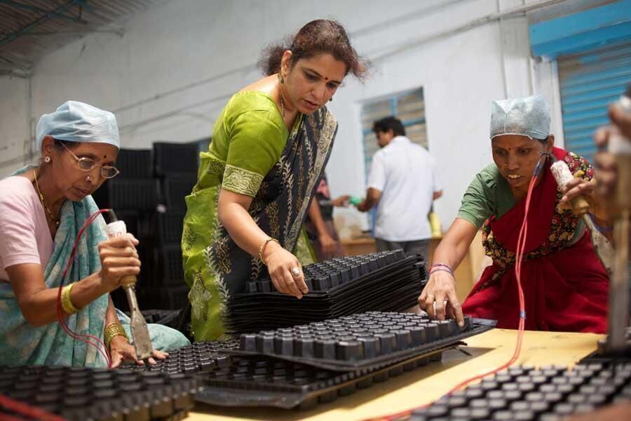Goldman Sachs, second among cash donors in the survey, is supporting the education of female entrepreneurs like Anagha Kulkarni (center), an alumna of the New York bank’s 10,000 Women program.