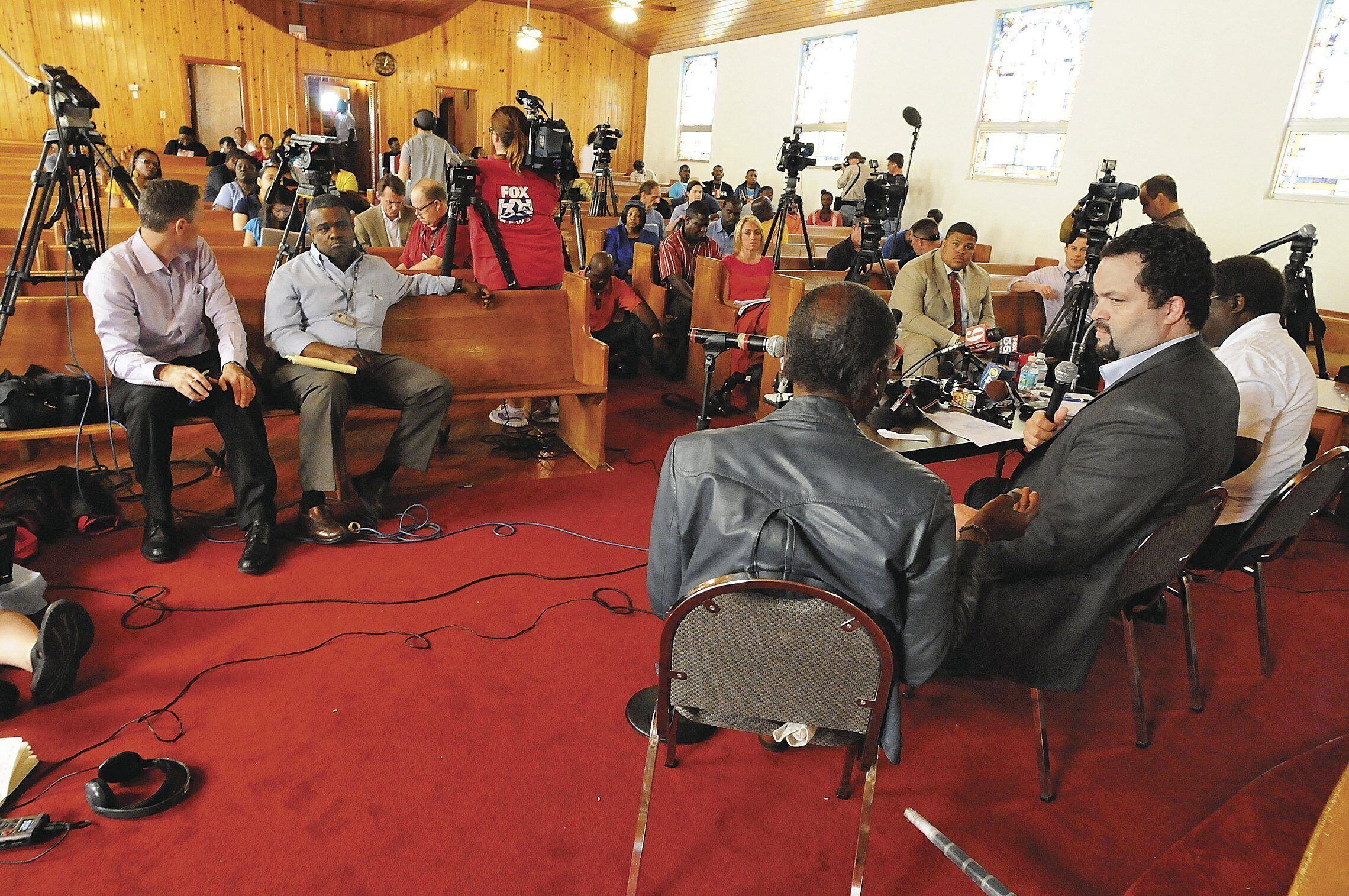 TAKING THE LEAP: Benjamin Jealous (at table, center) was the public face of an old-style philanthropy group, the NAACP. Now, he’s a partner with a venture-capital firm investing in socially minded for-profit companies.
