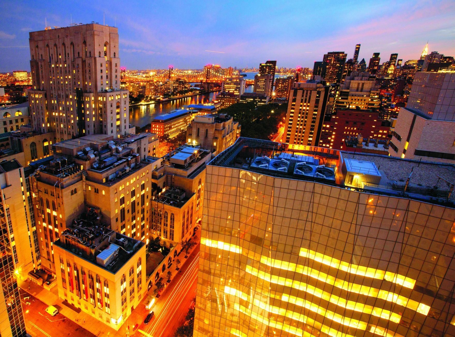 A $1.3 billion campaign added a new research center (right foreground) to Weill Cornell Medicine (left).