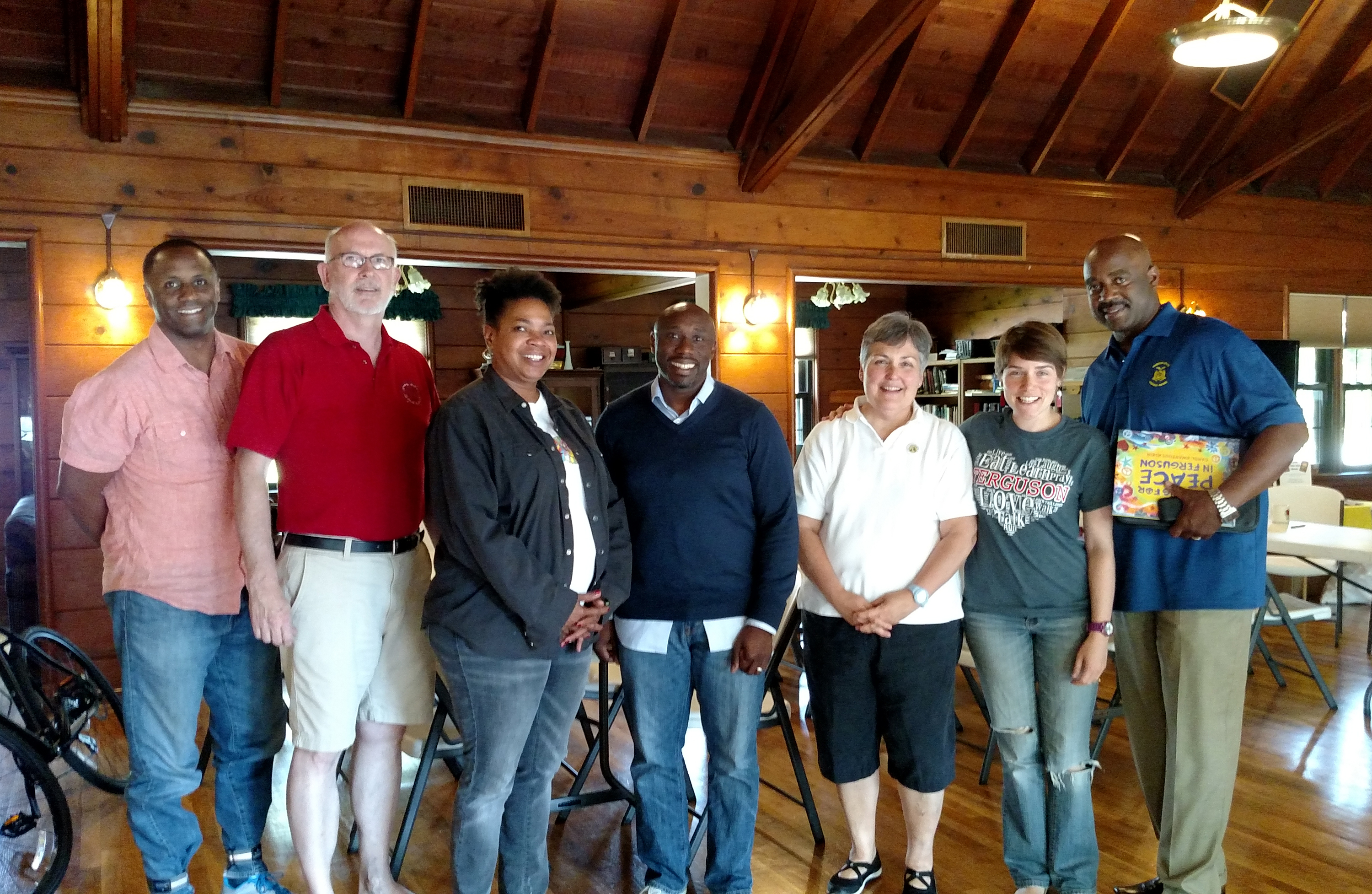 Come Together Ferguson committee members, left to right, teacher Raghib Muhammad, pastor Steve Lawler, nonprofit fundraiser Felicia Pulliam, pastor F. Willis Johnson, retired teacher Carolyn Randazzo, teacher Carrie Pace, and Missouri State Highway Patrol captain Ron Johnson. Not pictured is committee member Michael Petlansky, a police sergeant.
