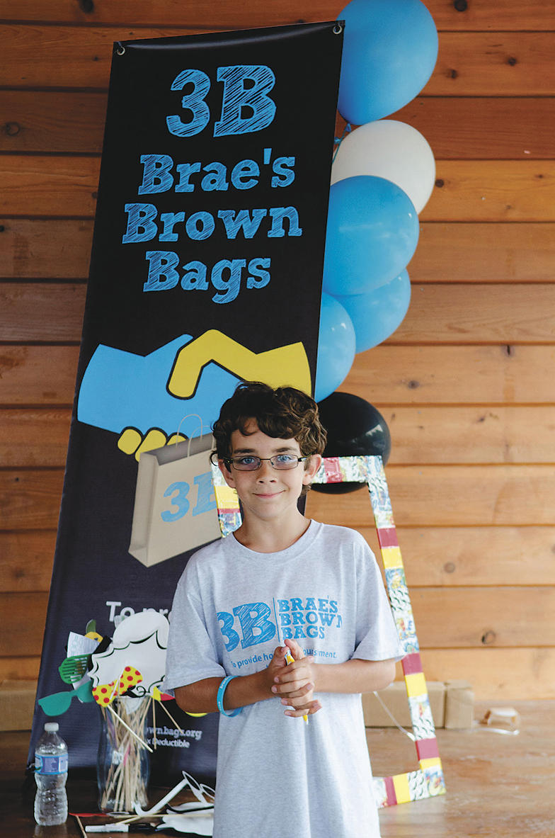 AN EARLY START: Braeden Quinn Mannering started a charity at age 9. Now 11, he’s  co-hosting a regional antihunger conference next month.