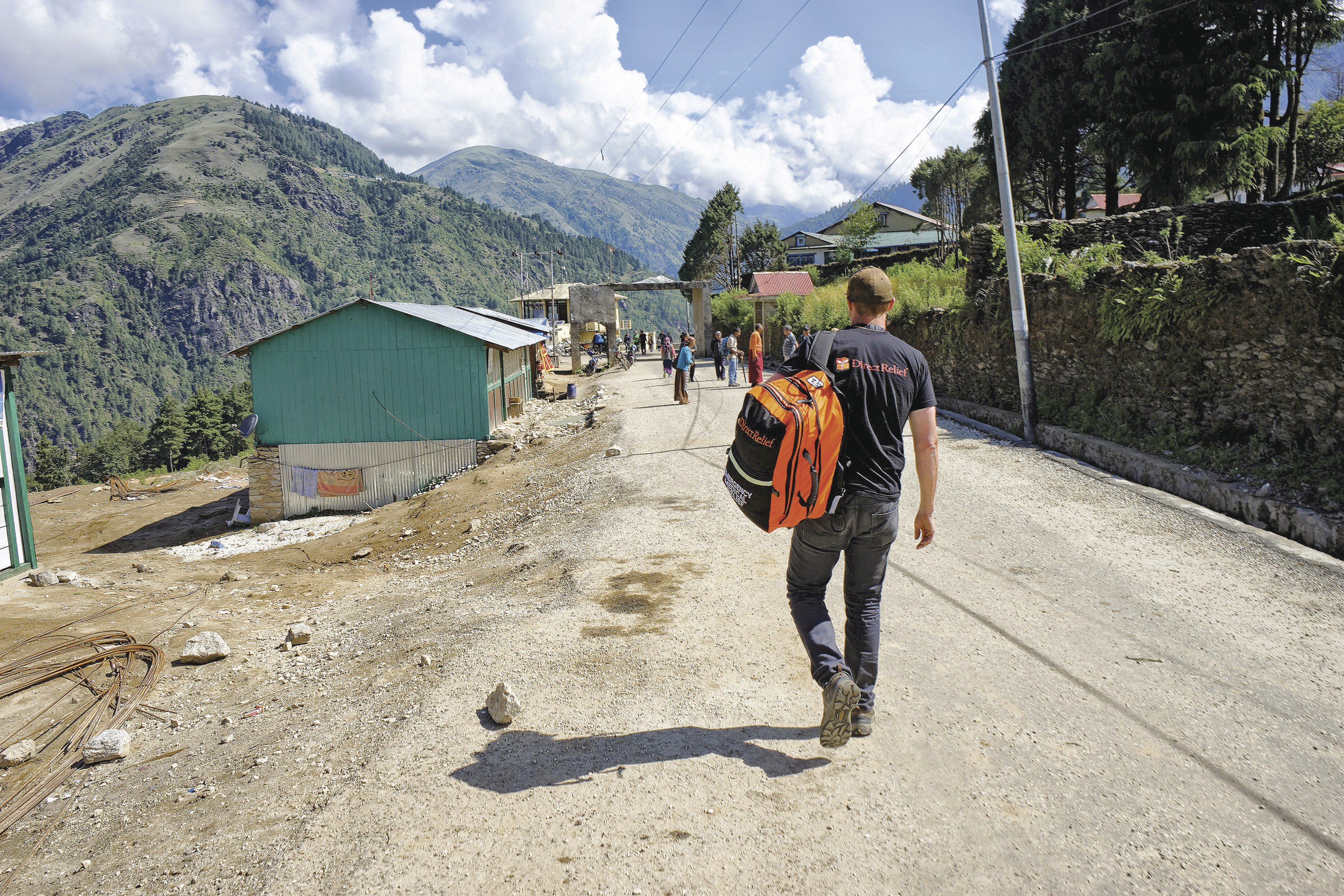 PEAK TRANSPARENCY: A Direct Relief worker brings medical supplies to a remote Nepalese village near Mount Everest. The aid charity is among the groups setting new standards for telling donors where their dollars go.