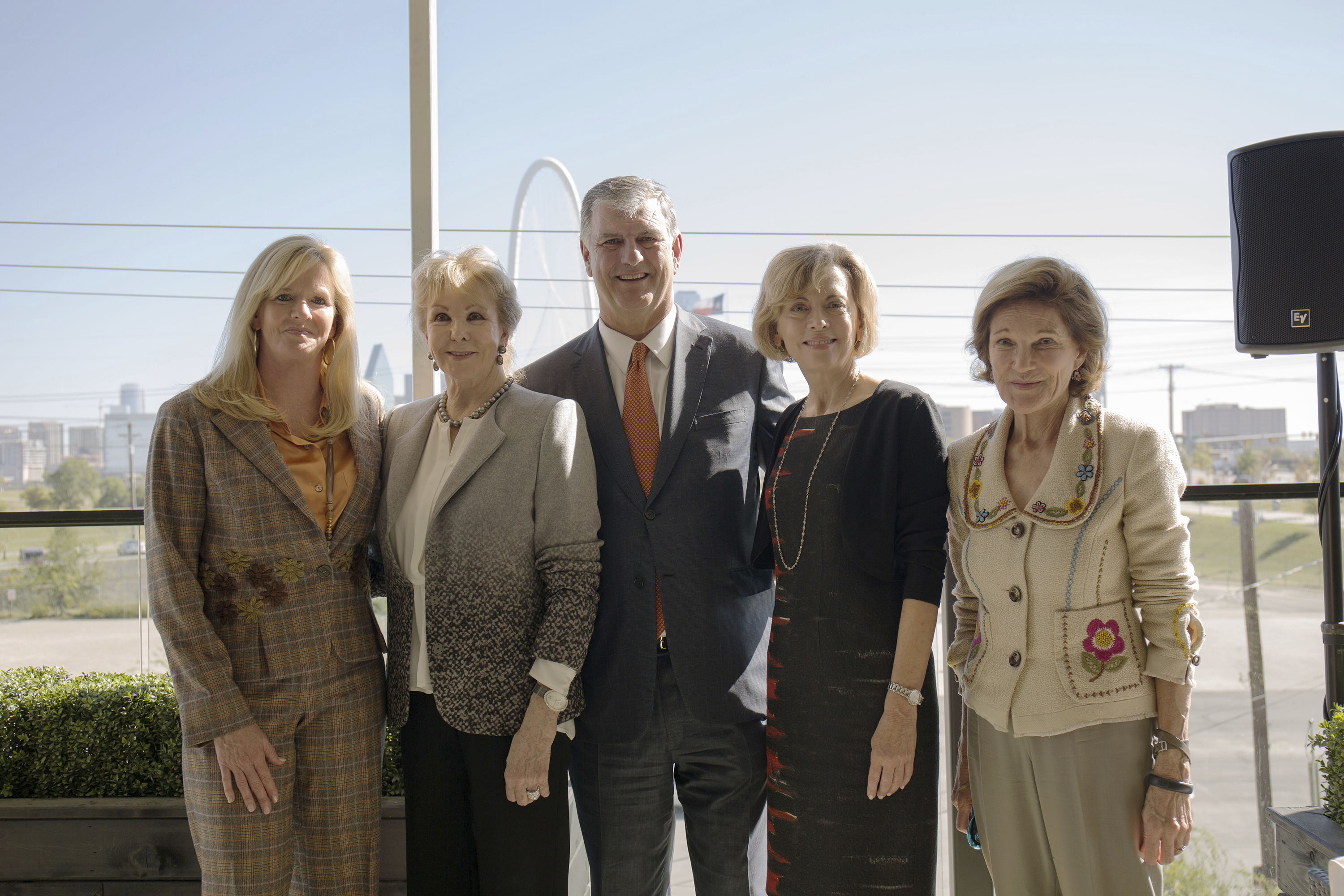 Annette Simmons (second from left) joins family members, Dallas Mayor Mike Rawlings, and Trinity Trust Foundation leader Deedie Rose (right) to announce a $50 million family donation for a planned Dallas park.