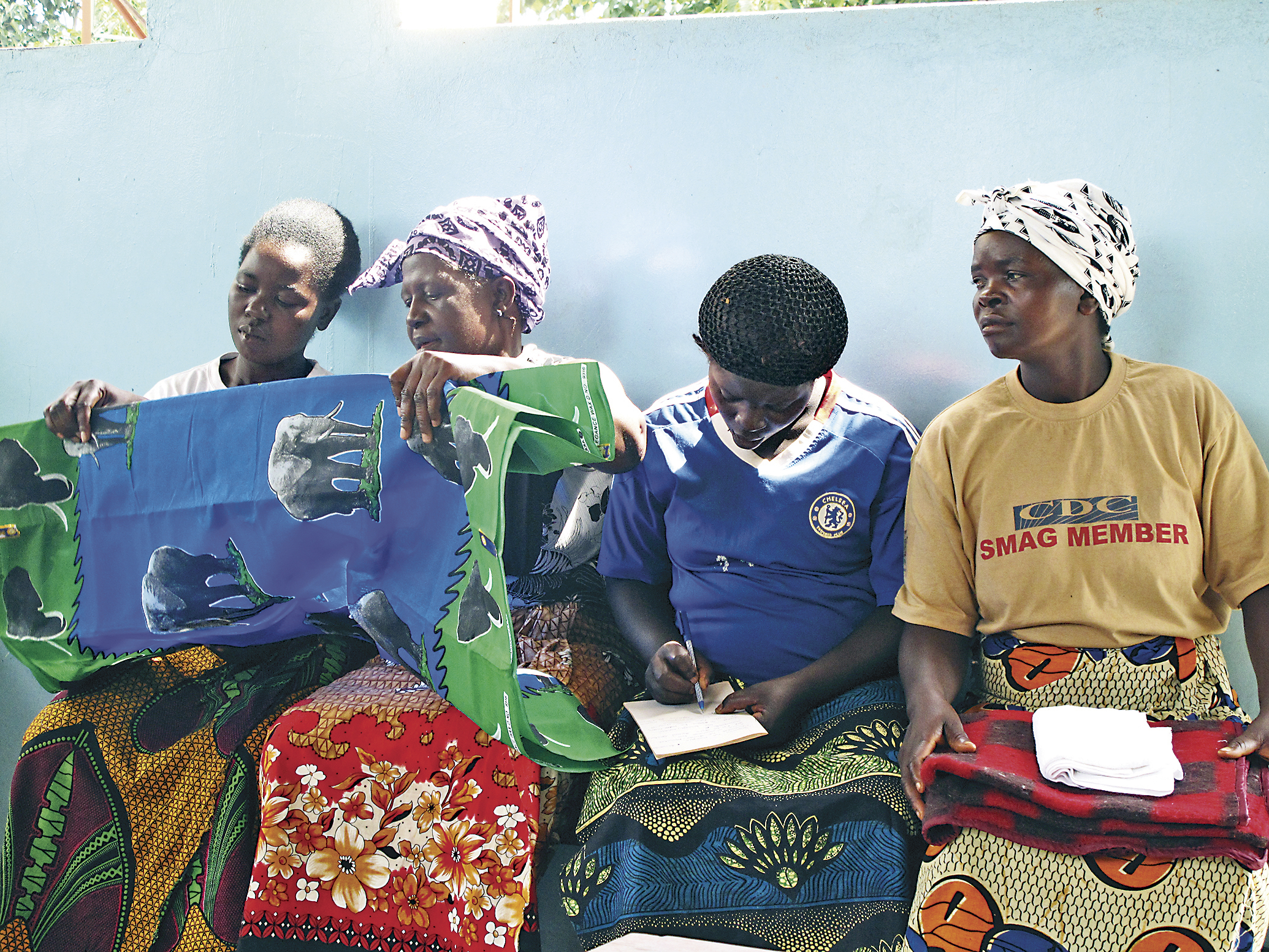 BABY STEPS: Zambian women examine “mama kits” as part of a study aimed at changing birthing behavior in the southern African nation.