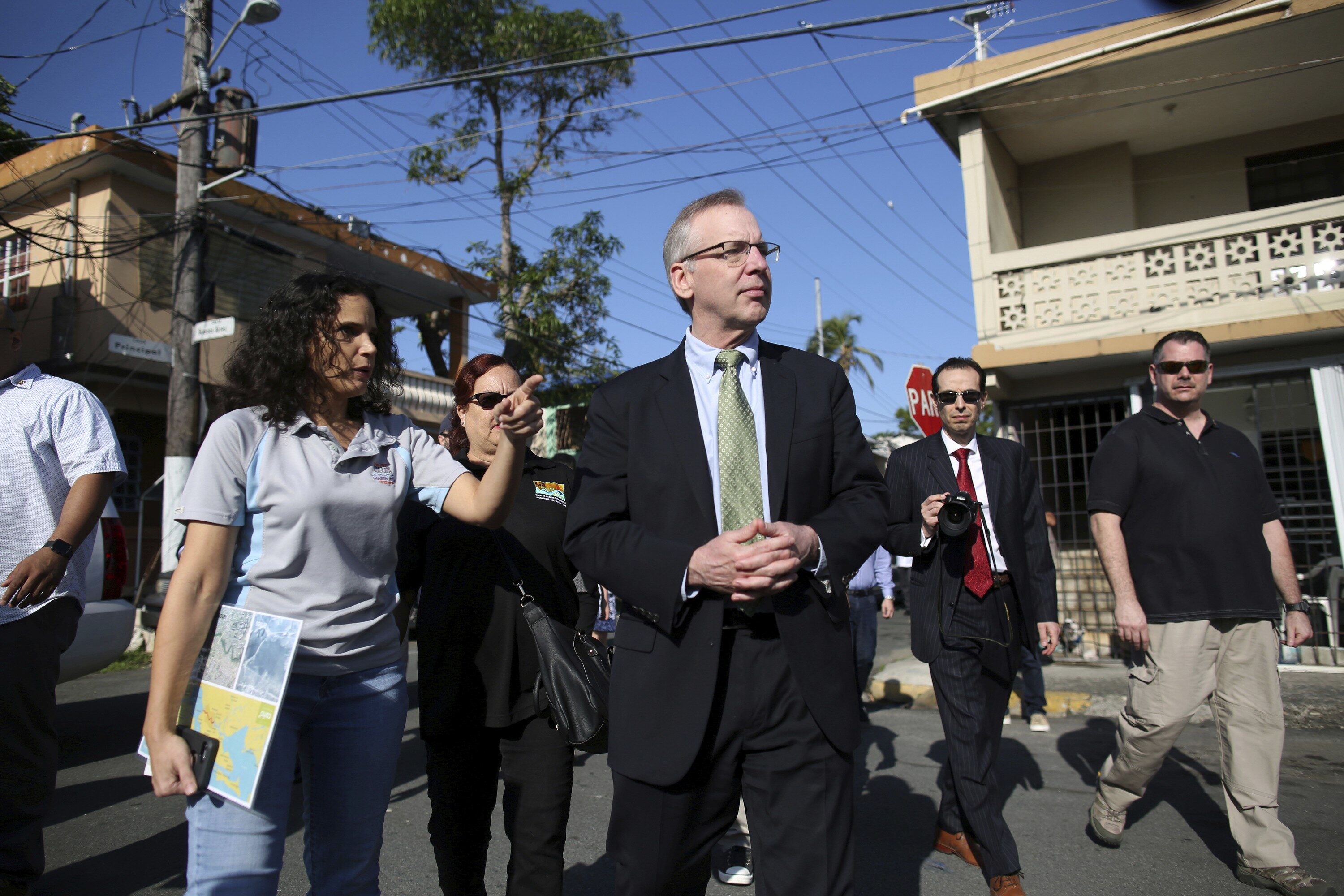 William Dudley, president of the Federal Reserve Bank of New York, tours the Caño Martín Peña neighborhoods of San Juan. Caño Martín, one of the island’s poorest areas, is hoping recovery funding will pay for a decade-old development and infrastructure plan.