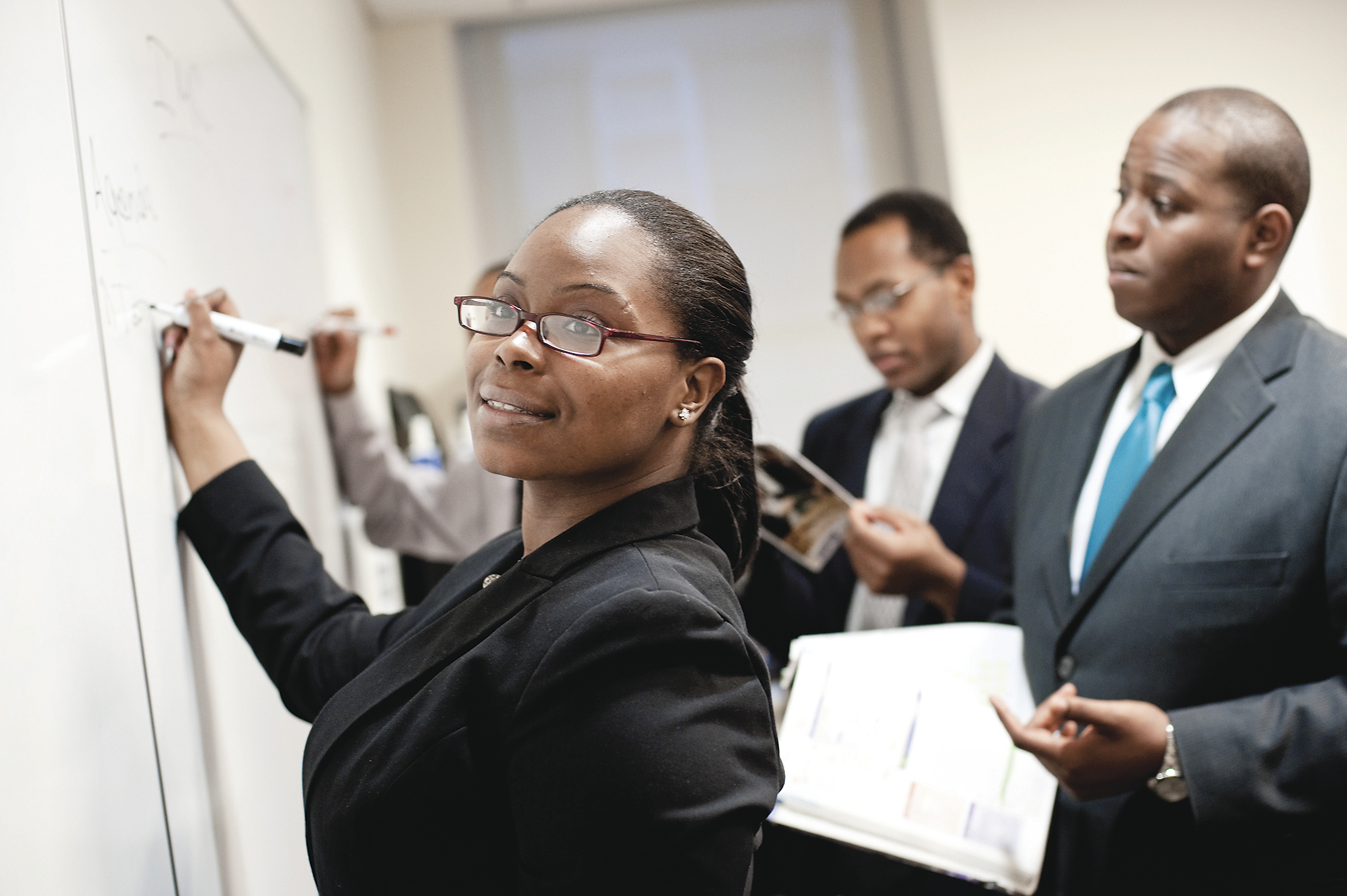 NUMBERS MATTER
: Year Up
analyzes reams of data to determine which markers will predict success for its budding professionals.