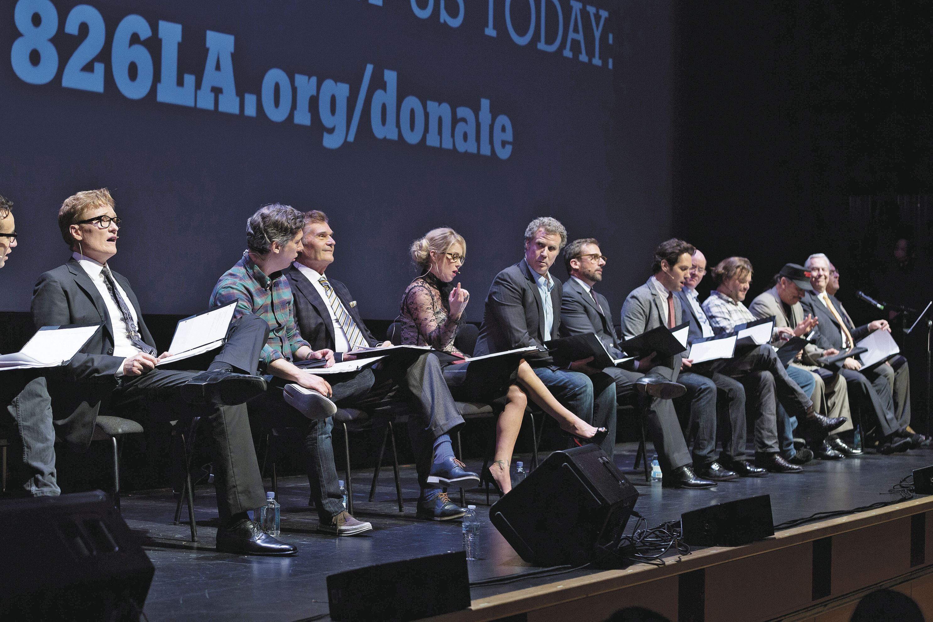 FAKE-NEWS FUNDRAISING: Conan O’Brien, far left, joins the cast of “Anchorman” — including Christina Applegate and, to her left, Will Ferrell, Steve Carell, and Paul Rudd — for a live reading of the 2004 comedy hit’s script to benefit student writing-skills nonprofit 826LA. Others at the event include