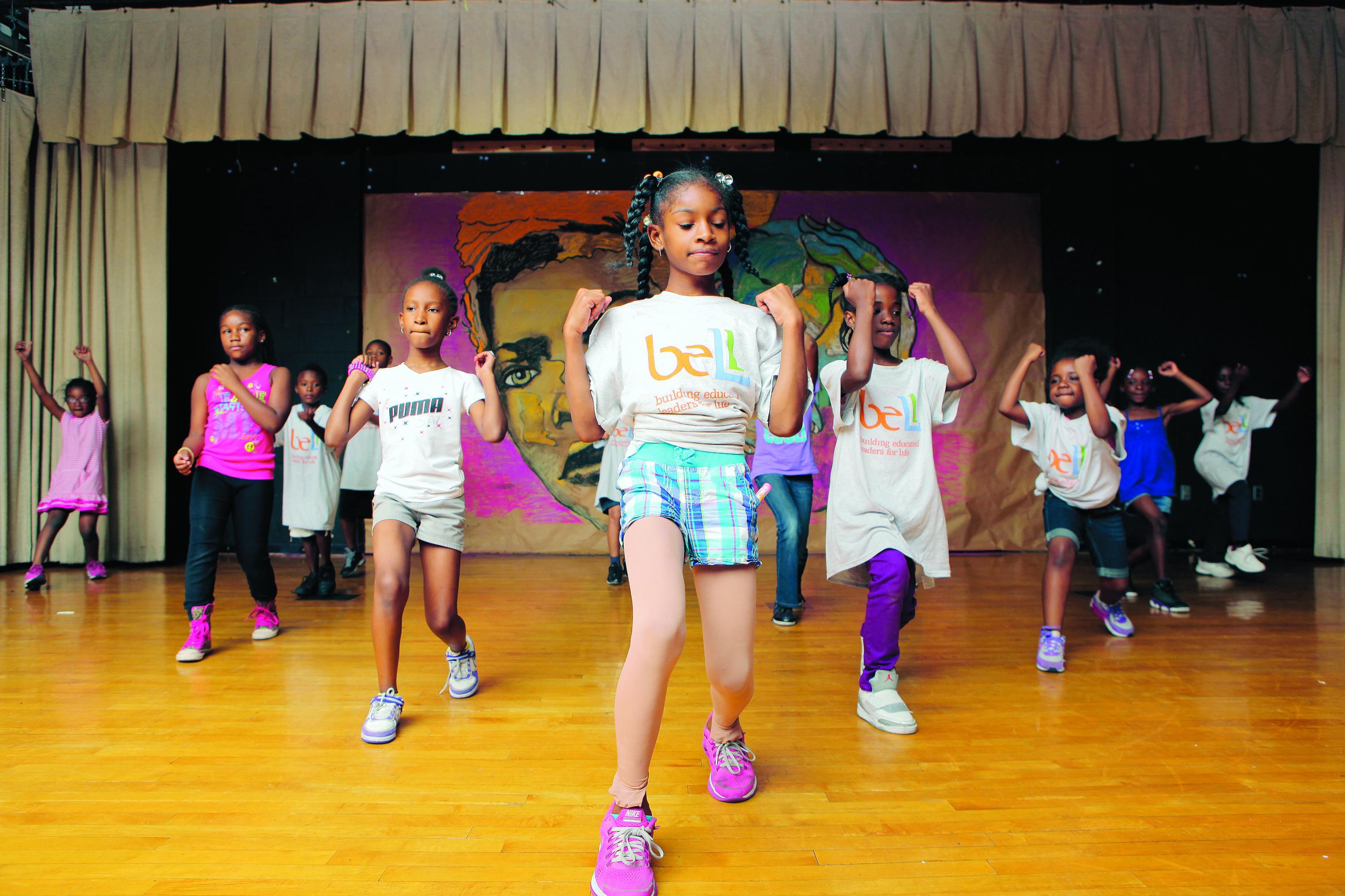 POWER
PARTNERSHIP: Building Educated Leaders for Life, or BELL, is working with the Y to expand the reach of its successful summer learning program. Here, students in a BELL summer program in Queens, N.Y., mix in some dance practice.