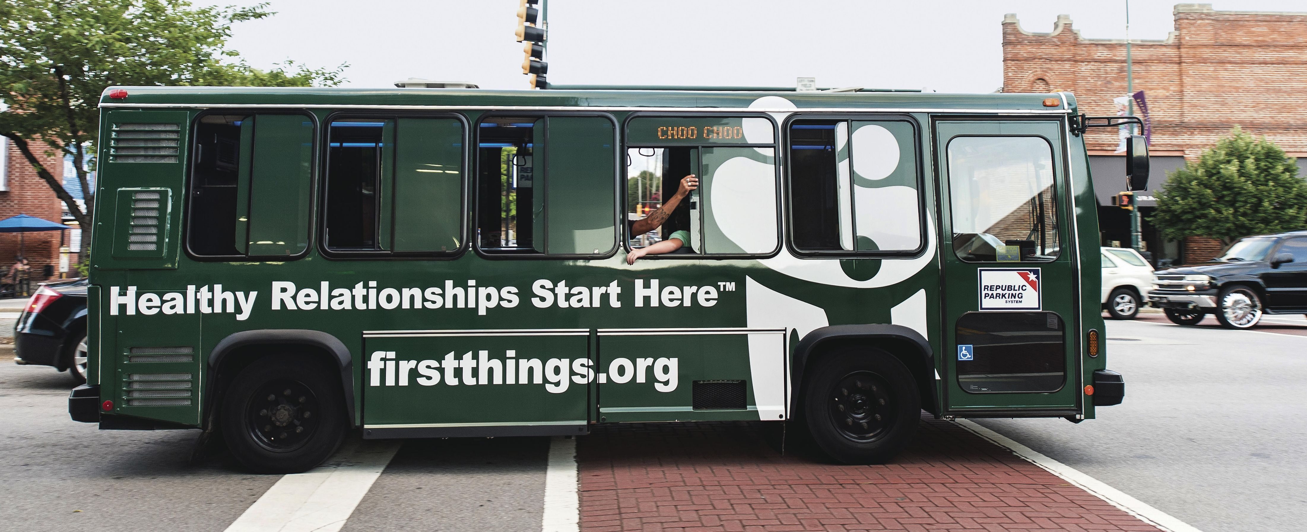 A trolley bus promoting First Things First rolls through Chattanooga. The group, which aims to strengthen families, also advertises through highway billboards.