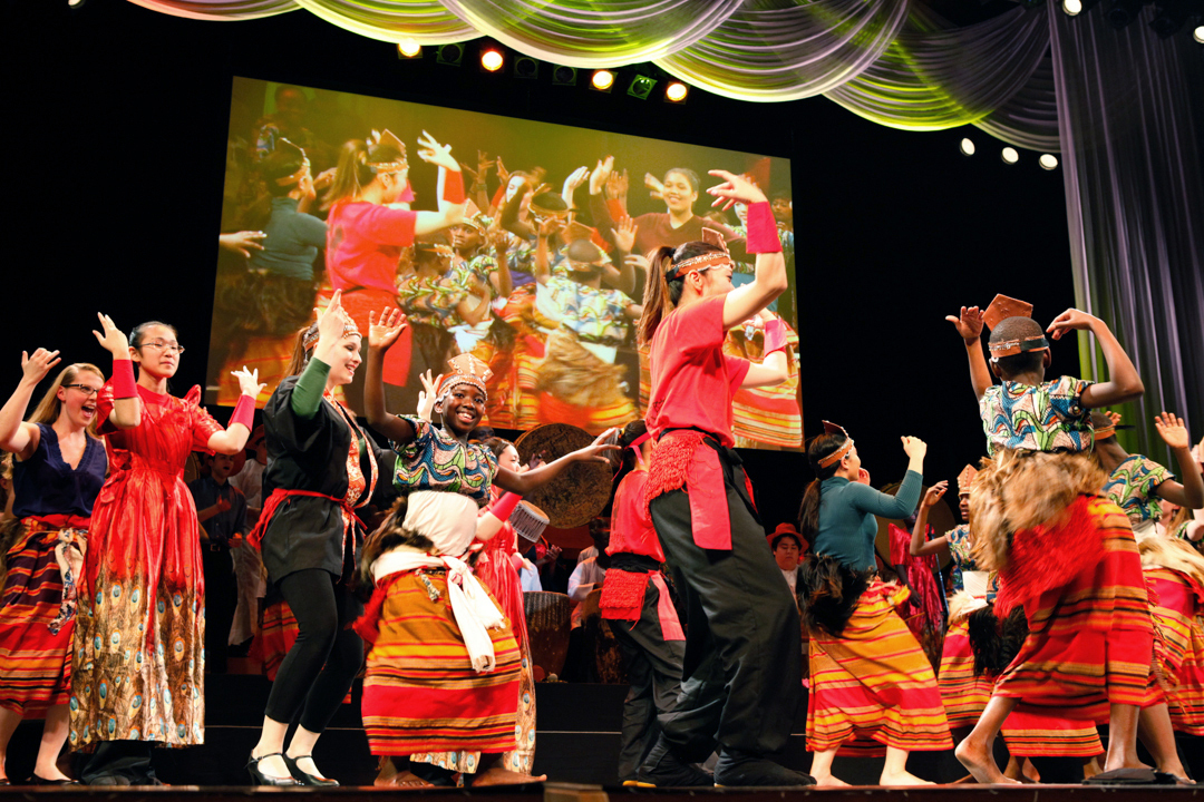Ugandan children joined Vassar choral students and Japanese drummers to perform “At Home in the World” in Japan. The show will come to the United State in June.