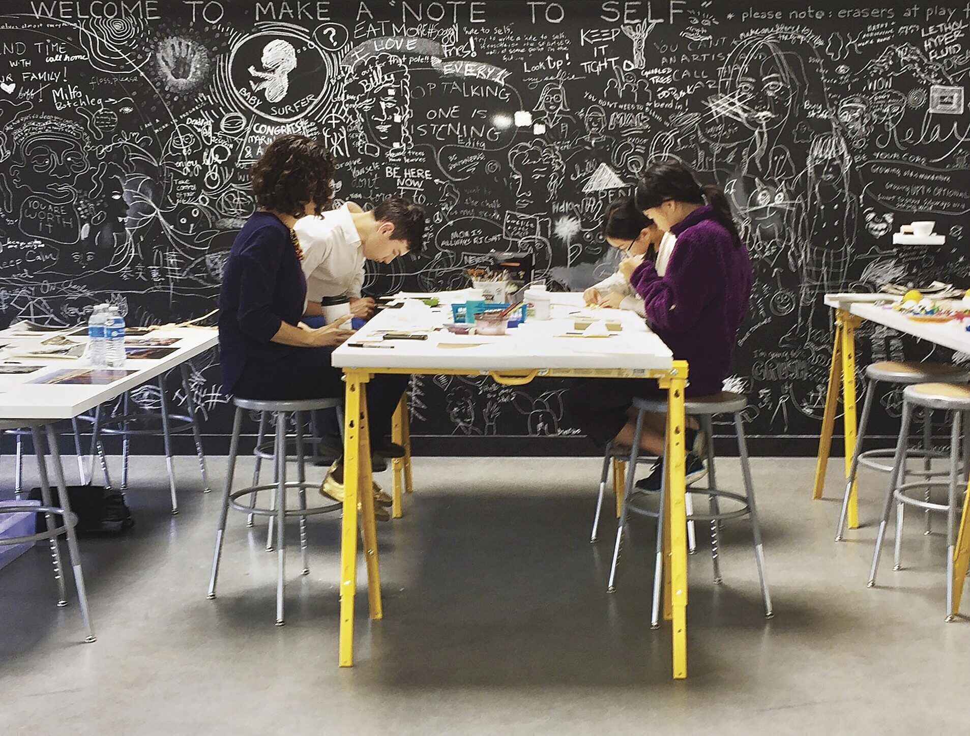 Students work at the San Francisco Arts Education Project at Minnesota Street. Before moving to the complex, the 50-year-old nonprofit never had a space to call its own. (Photo by Chad Jones)