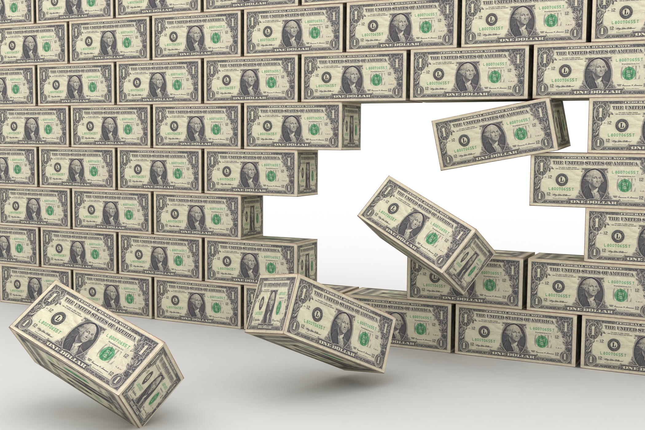 A 3D image of a wall made of US one-dollar bills, with several blocks falling from the right side, suggesting construction.