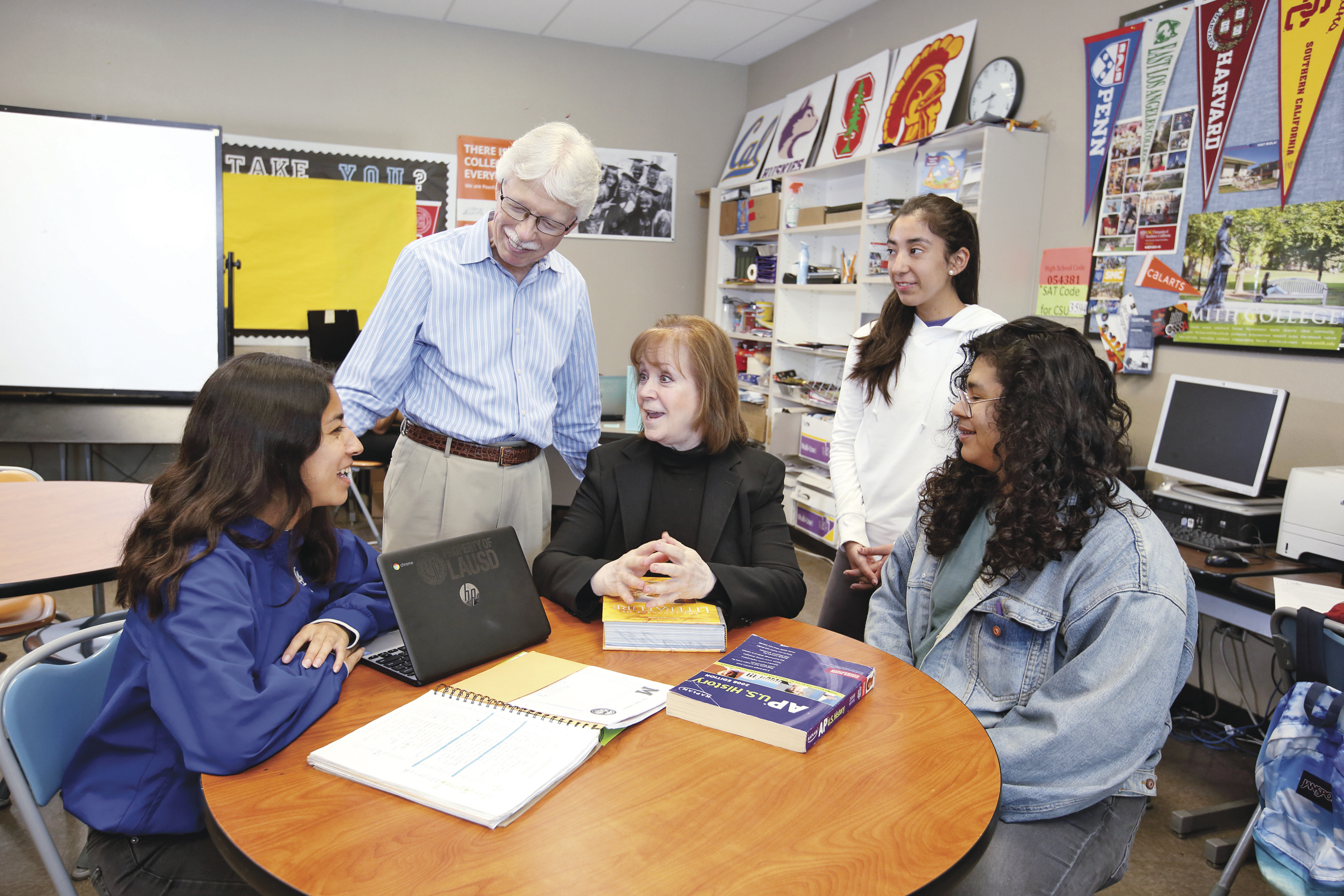 The Lundquists meet with students at Mendez High School in Los Angeles’s Boyle Heights neighborhood. Melanie Lundquist says getting to know the communities at schools the couple supports has “been the best journey of our lives.”