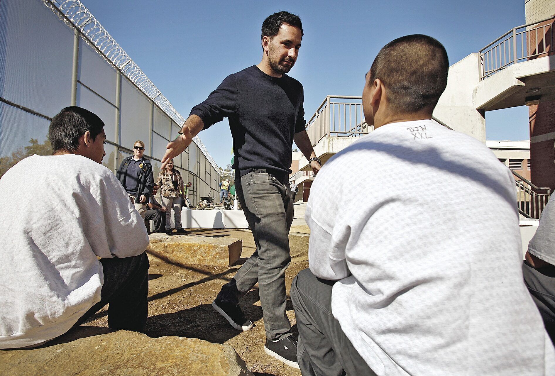 MAKING CONNECTIONS: Scott Budnick greets incarcerated youths at the Barry J. Nidorf Juvenile Hall in Sylmar, Calif.,
where he started a vegetable garden, among other programs.