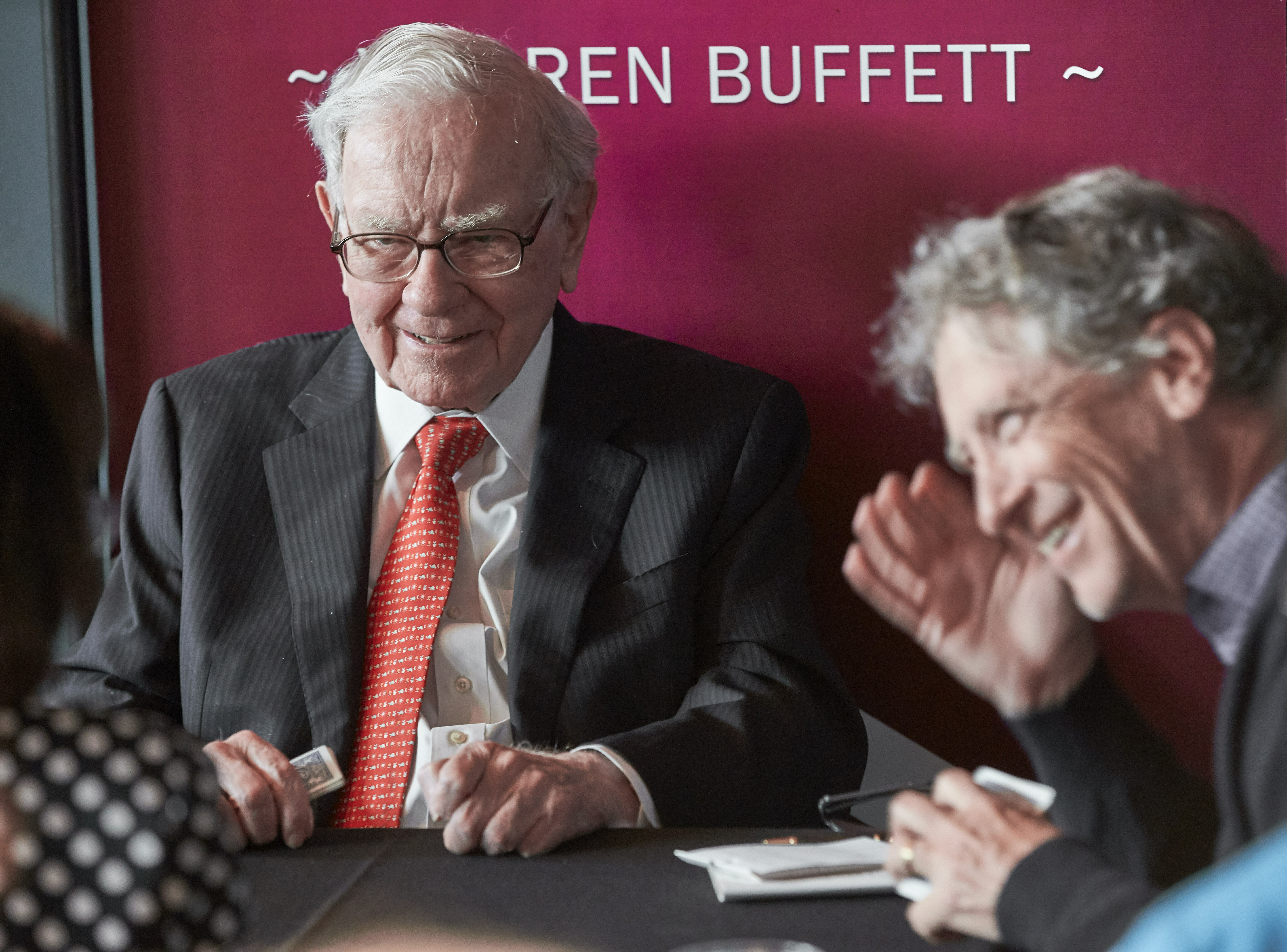 FILE - Warren Buffett, Chairman and CEO of Berkshire Hathaway, left, plays bridge with Bill Gates, following the annual Berkshire Hathaway shareholders meeting on May 5, 2019 in Omaha, Neb. (AP Photo/Nati Harnik, File)