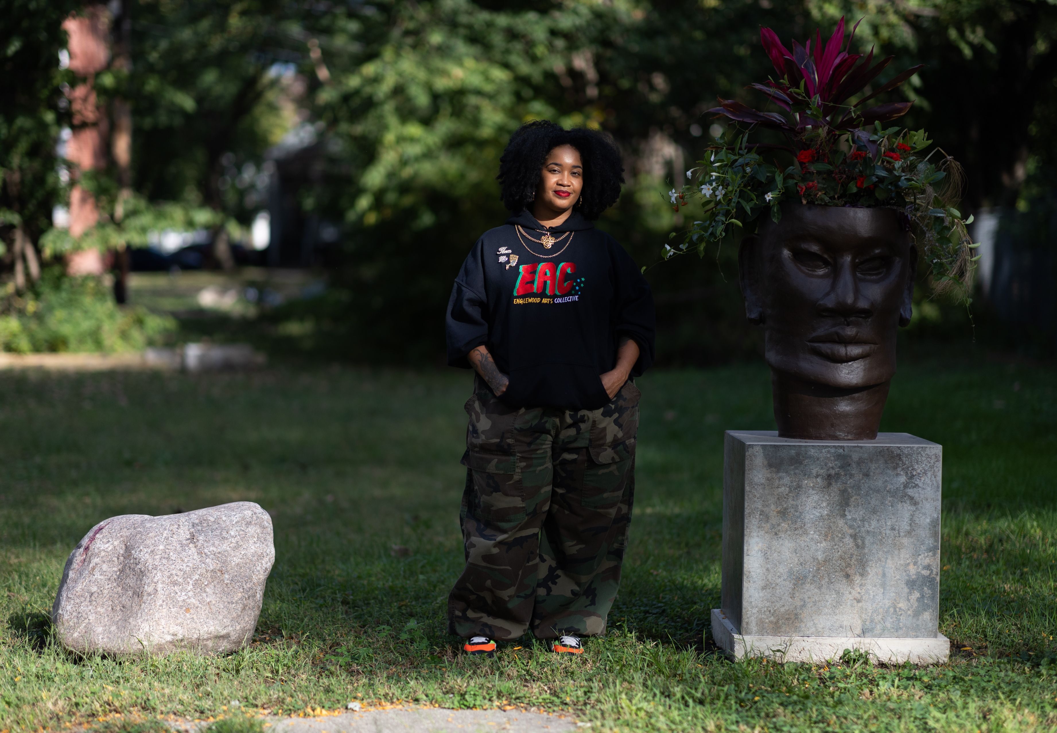 Artist Tonika Lewis Johnson stands for portrait in the 6500-block of South Aberdeen Street in Chicago's Englewood neighborhood, on Monday, Oct. 6, 2025. (AP Photo/Talia Sprague)