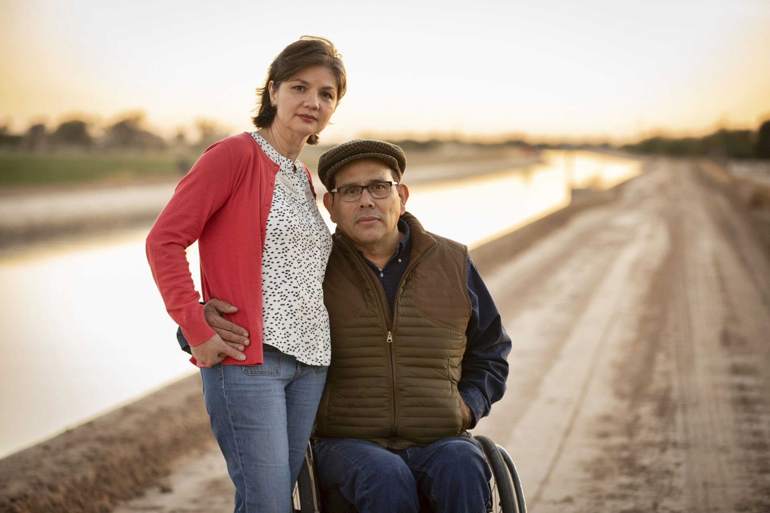 Juan Bosco, Alma and Sofia (daughter) Sandigo near their ranch outside of Yuma, AZ.