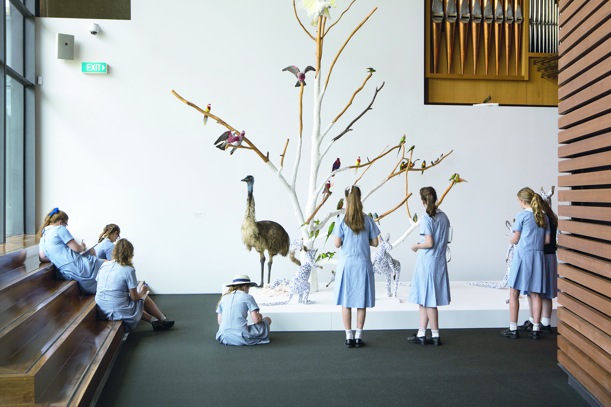 Visual-arts students from the Stuartholme School, in the Australian town of Toowon, view indigenous artist Danie Mellor’s “Exotic Lies Sacred Ties” exhibition at the University of Queensland Art Museum. The museum was established in 1976. The foundation gave $2.5 million to help the university convert a building into exhibit space.