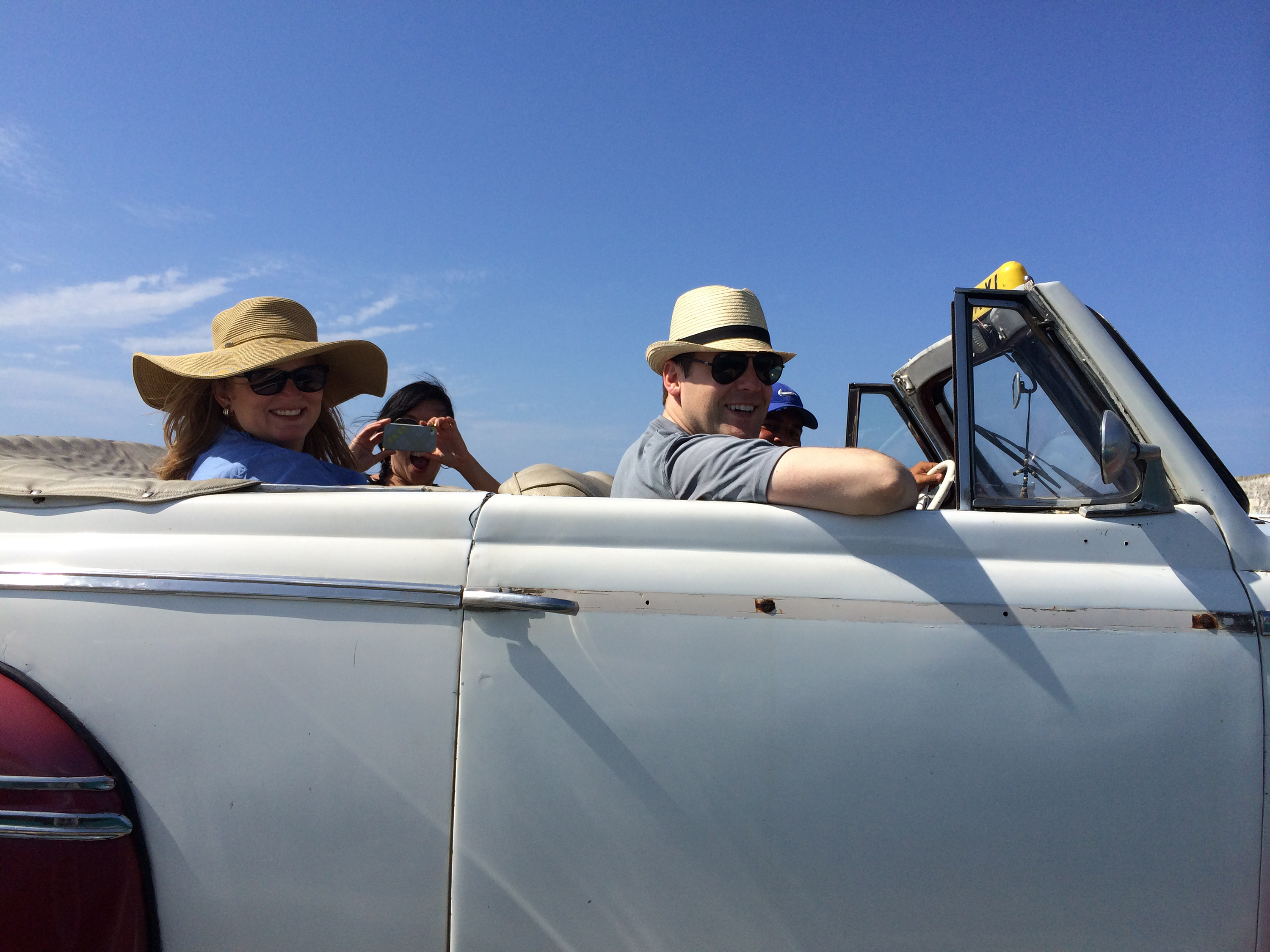 Helen Tolar, Betsy Lin, and Dean Hingson, chiefs of staff for members of the United States Senate, enjoy a tour of Havana during a May 2014 visit to the island hosted by the Center for Democracy in the Americas.