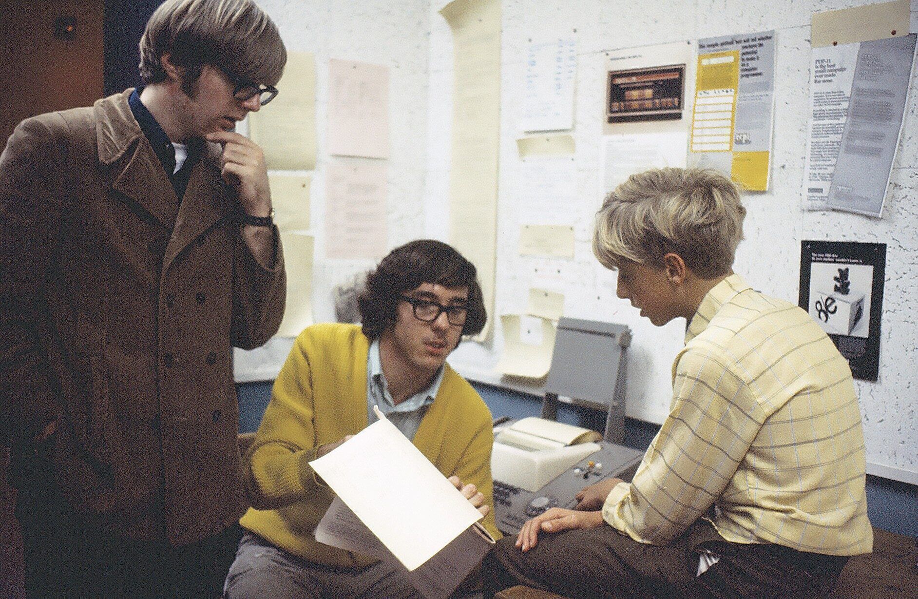 IN ON THE  GROUND FLOOR: Ric Weiland  (center) was one of the first people  Microsoft hired when his high-school classmates Paul Allen (left)  and Bill Gates (right) started the company in the mid-1970s.