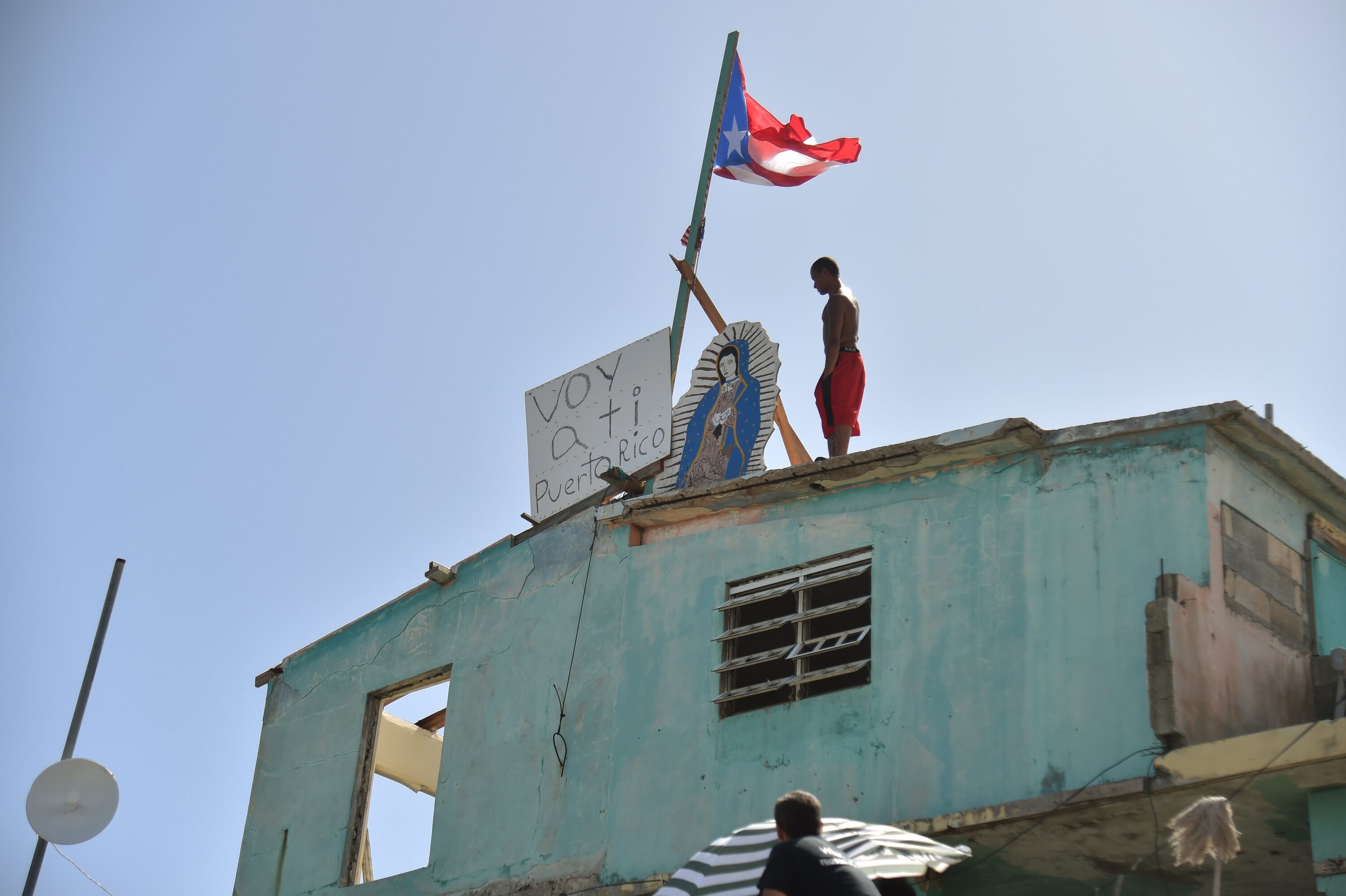 “I’m with you, Puerto Rico” reads the sign atop a house in eastern Puerto Rico just after last year’s hurricanes. The island’s nonprofits played a critical role in relief efforts immediately after the storms and hope to shape recovery efforts underway now.