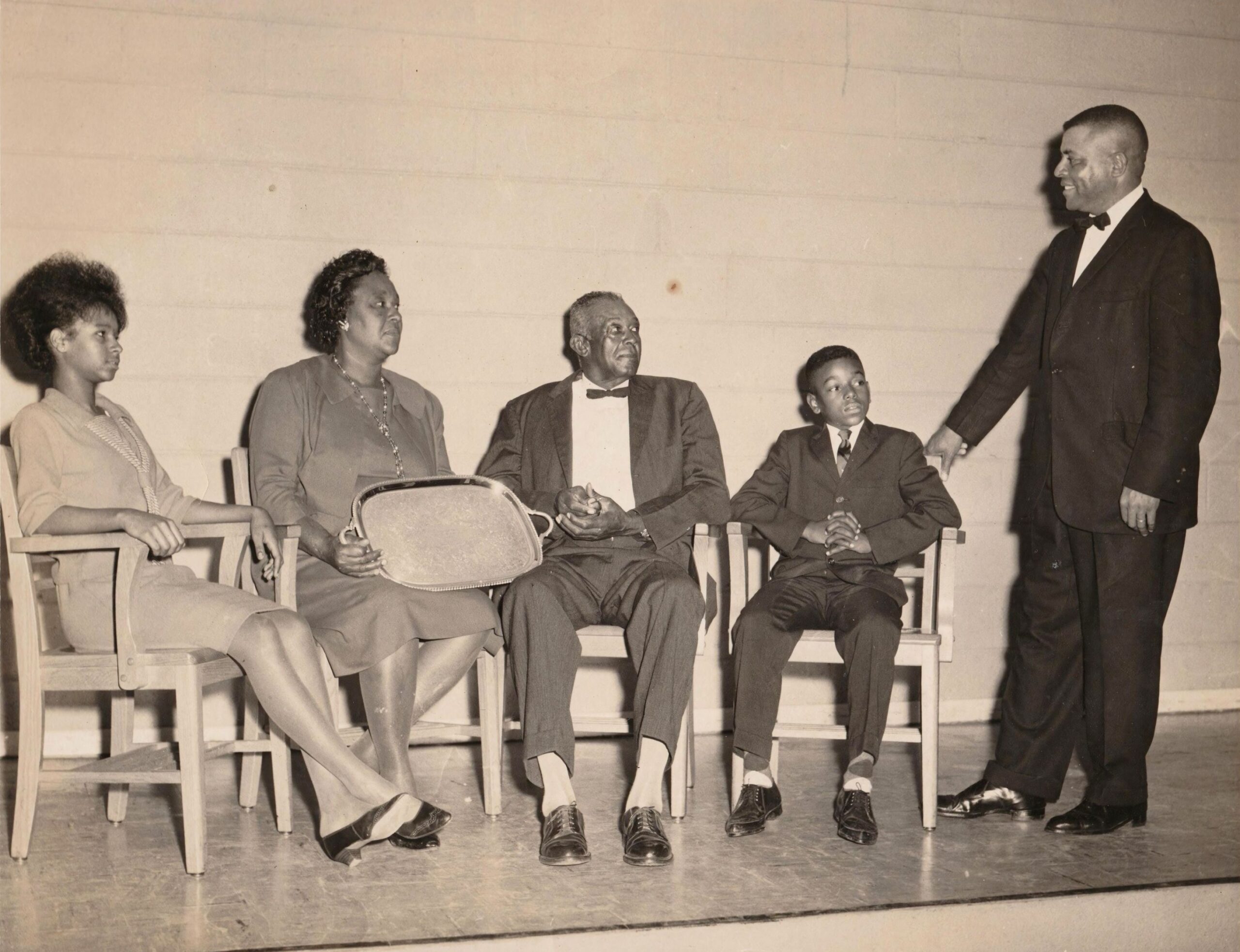 Tycely Williams’ grandparents, Lucille and R.J. Anderson, her mother, Jerona Anderson, and uncle, Raymond Anderson, are seen in 1963 receiving the county’s Farmers Association “Family of the Year” award at Wilkinson High School in Orangeburg, S.C.