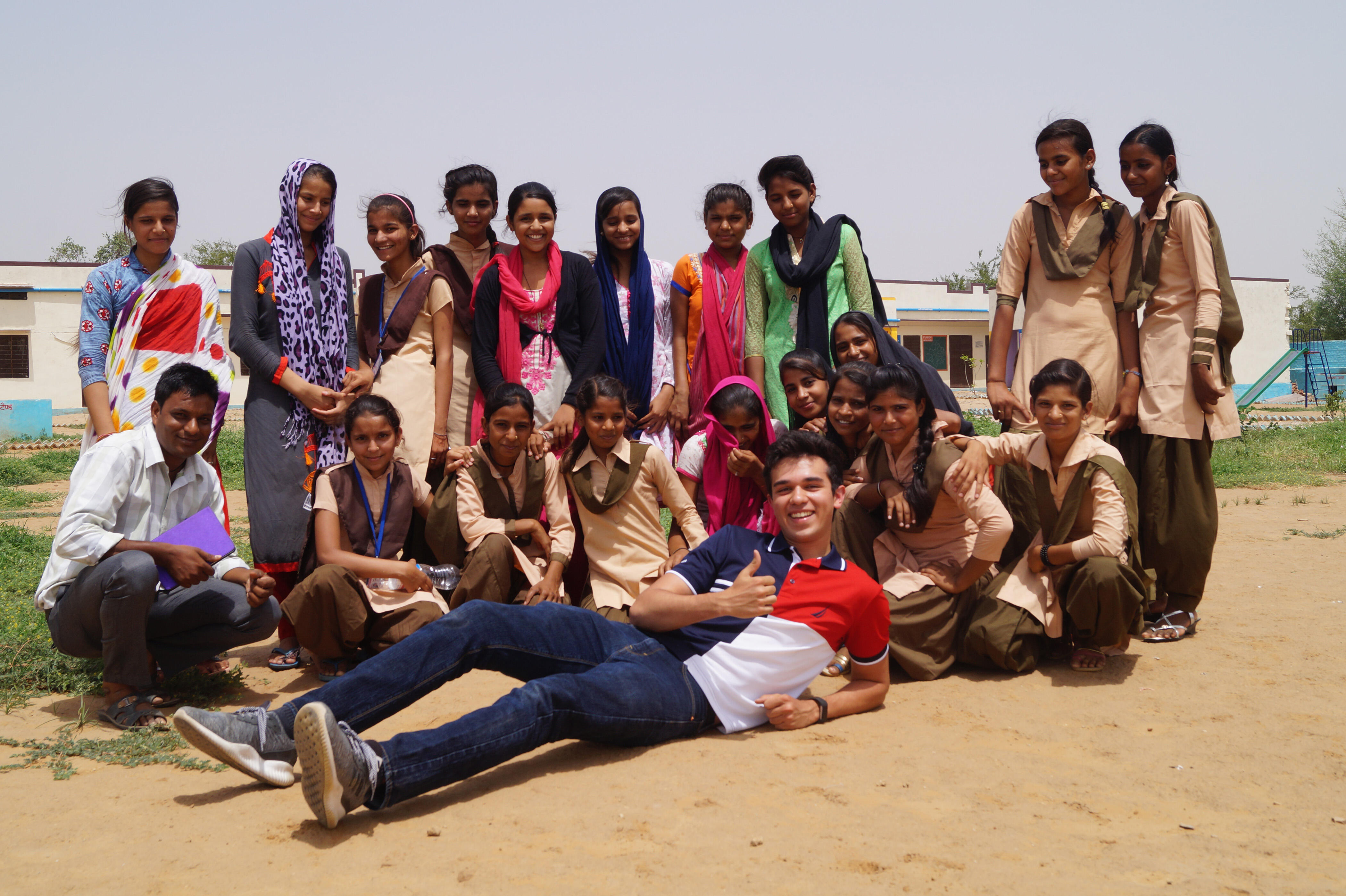 Members of the India Philanthropy Alliance harness the energy and talents of young people in a variety of ways, including through internships. Here former Sehgal Foundation intern Ashwin Sinha visits a school in Kalsara, Rajasthan. 