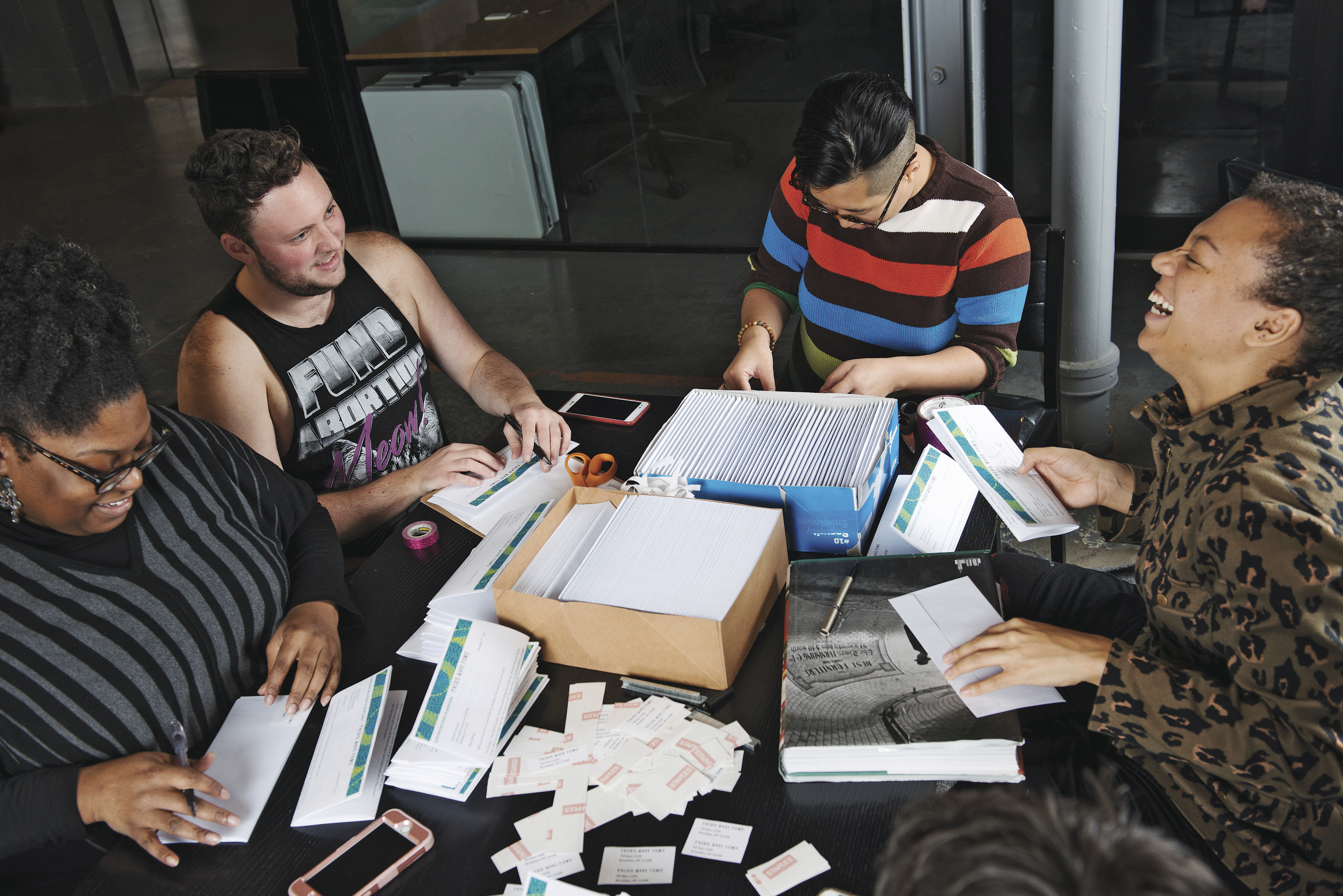 TEAMWORK<BR>The staff of The Third Wave Fund switched to a four-day workweek with no drop in productivity, says leader Rye Young (second from left). He thinks that’s a better reward than offering sabbaticals, which benefit mostly people at the top.