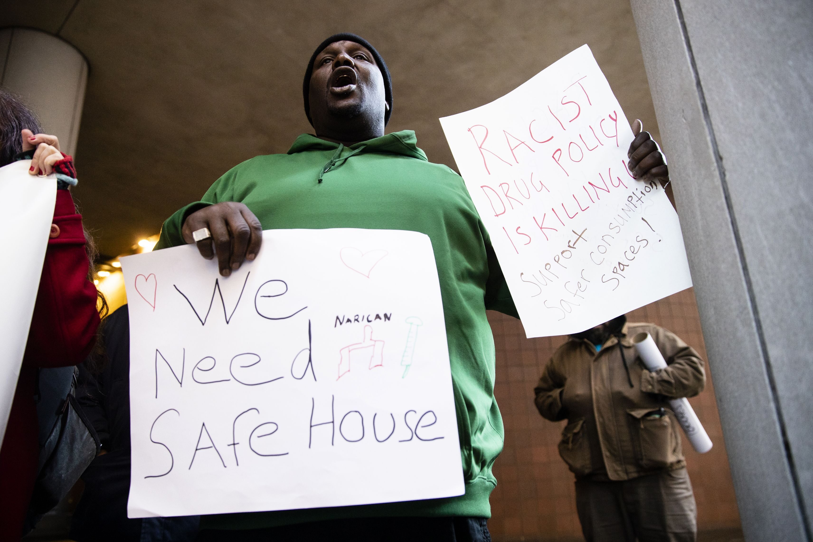A protester demonstrates in support of a supervised injection sites in Philadelphia, Tuesday, Dec. 3, 2019.