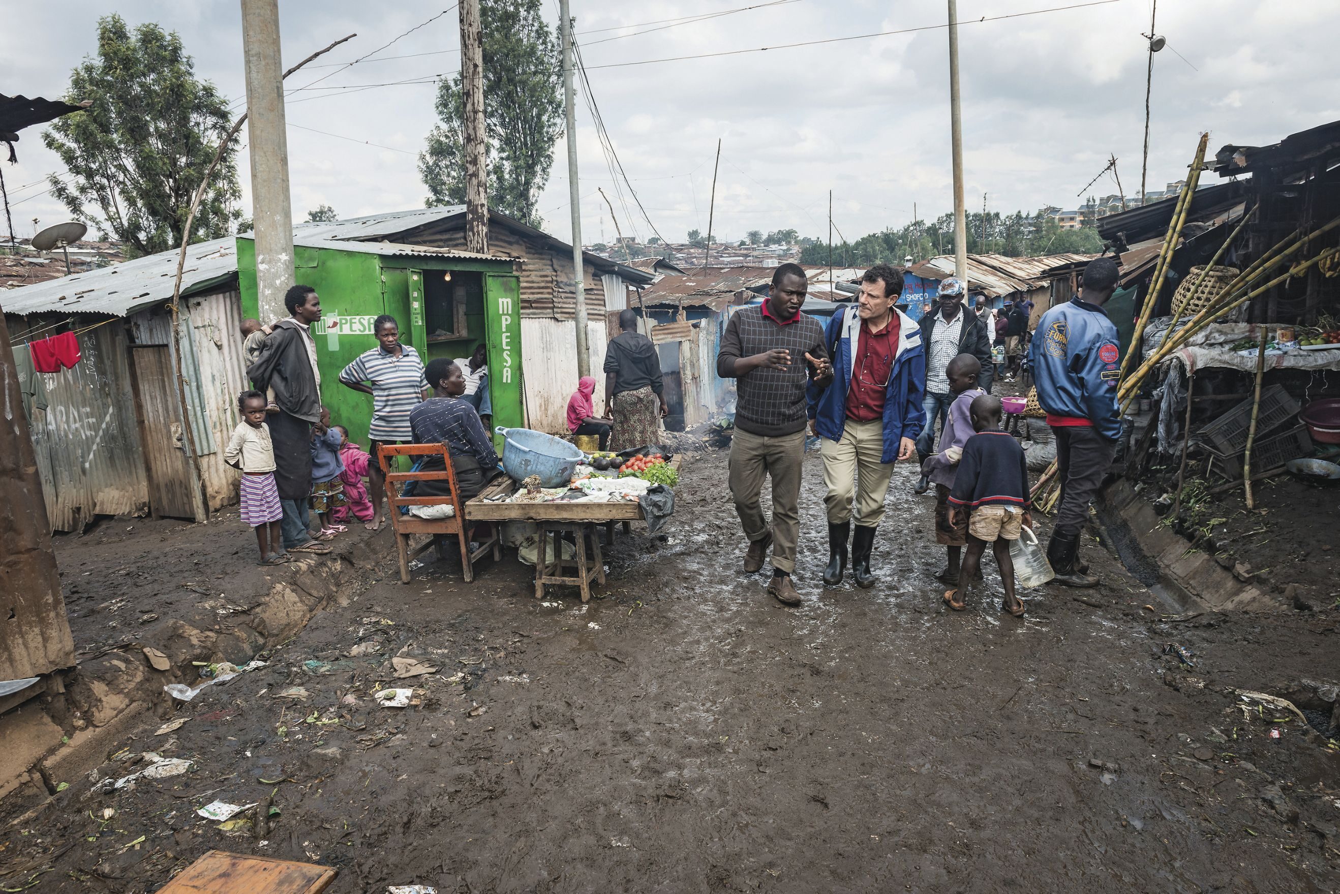 EDUCATING NICK: Mr. Kristof with Kennedy Odede, the founder of Shining Hope for Communities. The columnist has written a number of times about the group, which has built two tuition-free school for girls in Kenyan slums. 