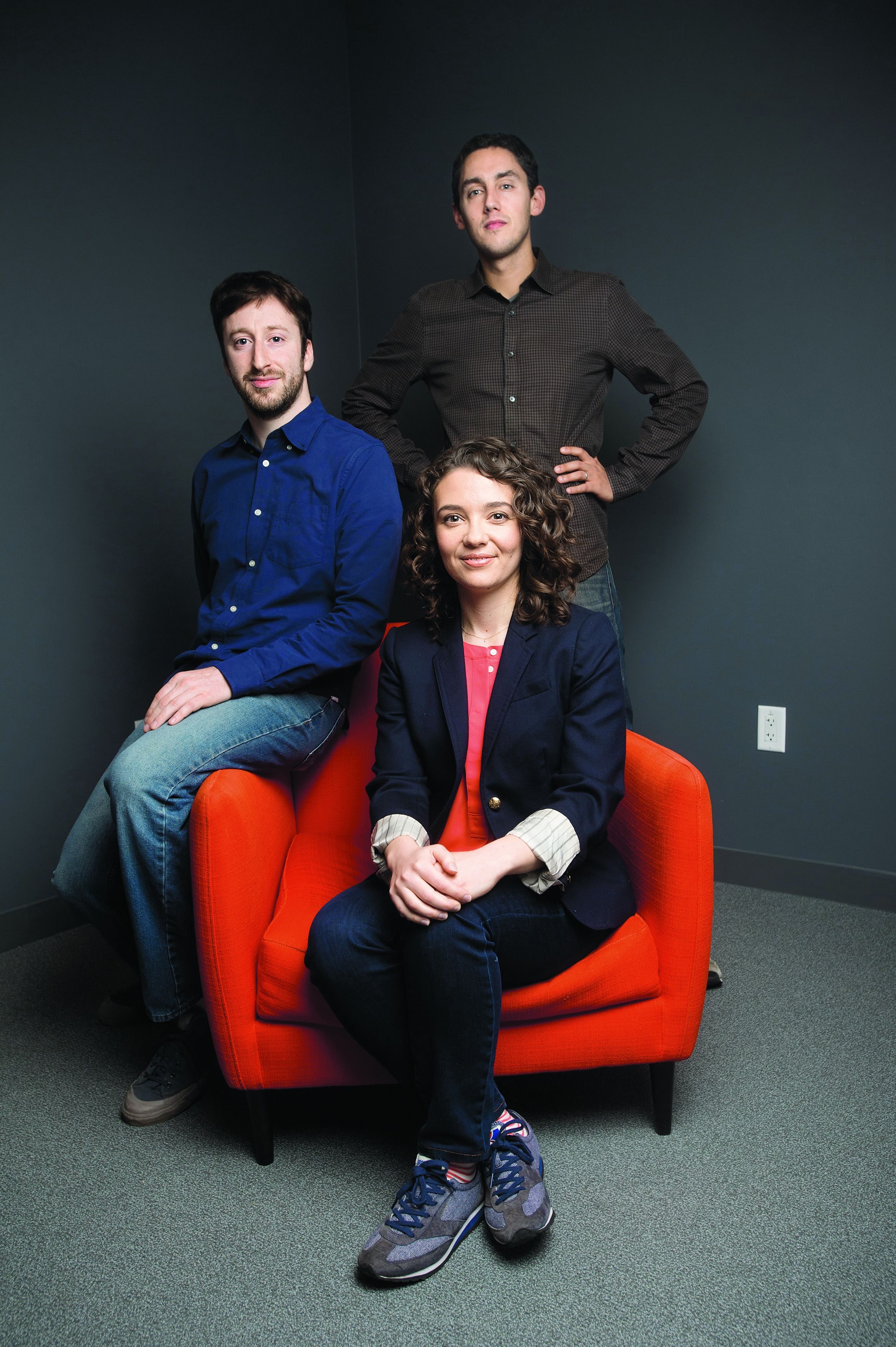 FOLLOWING SUIT - Early on, Cari Tuna was drawn to GiveWell, founded by Elie Hassenfeld (standing) and Holden Karnofsky, and its philanthropy. 