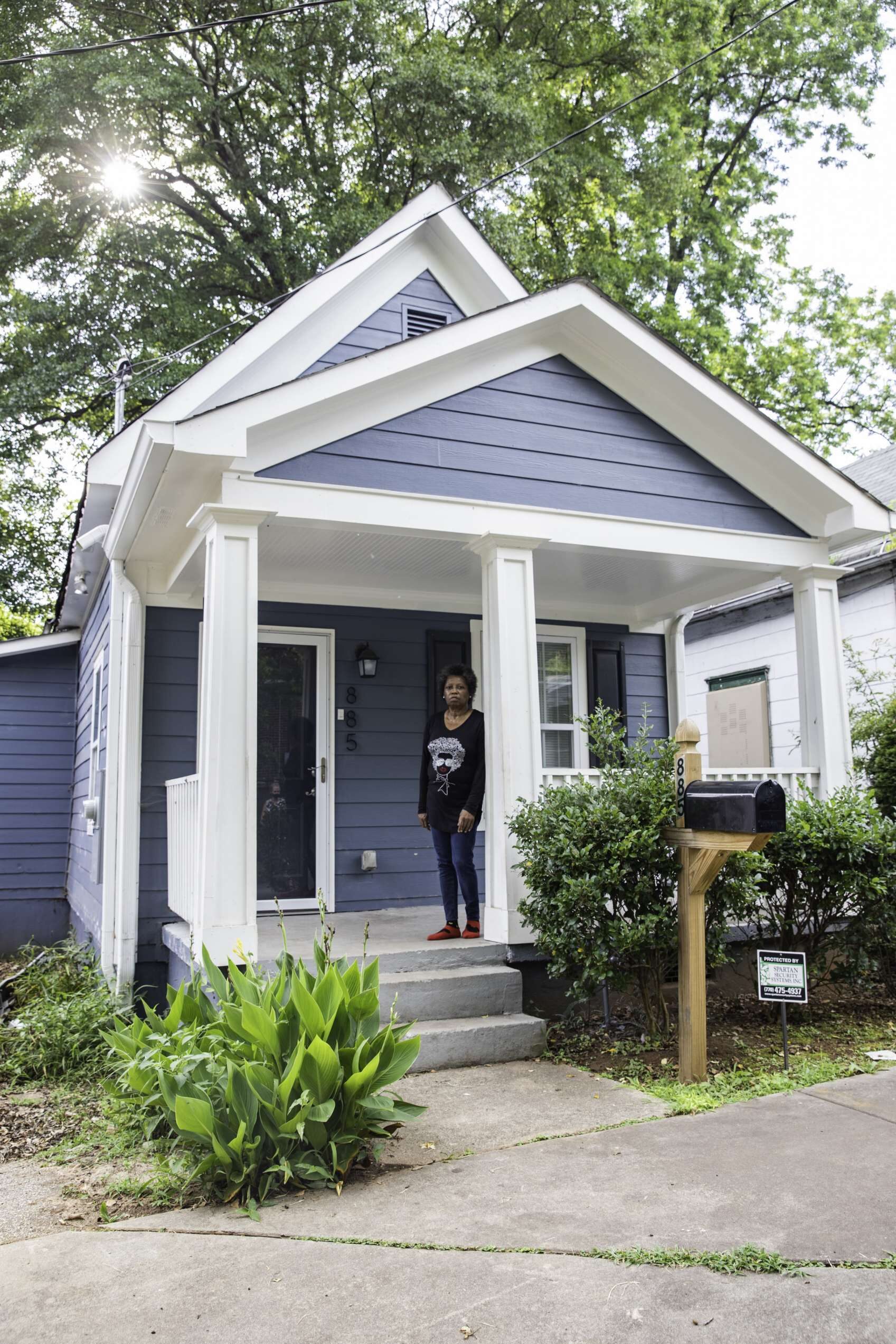 Thelma Christian in front of her house purchased through the Atlanta Land Trust.