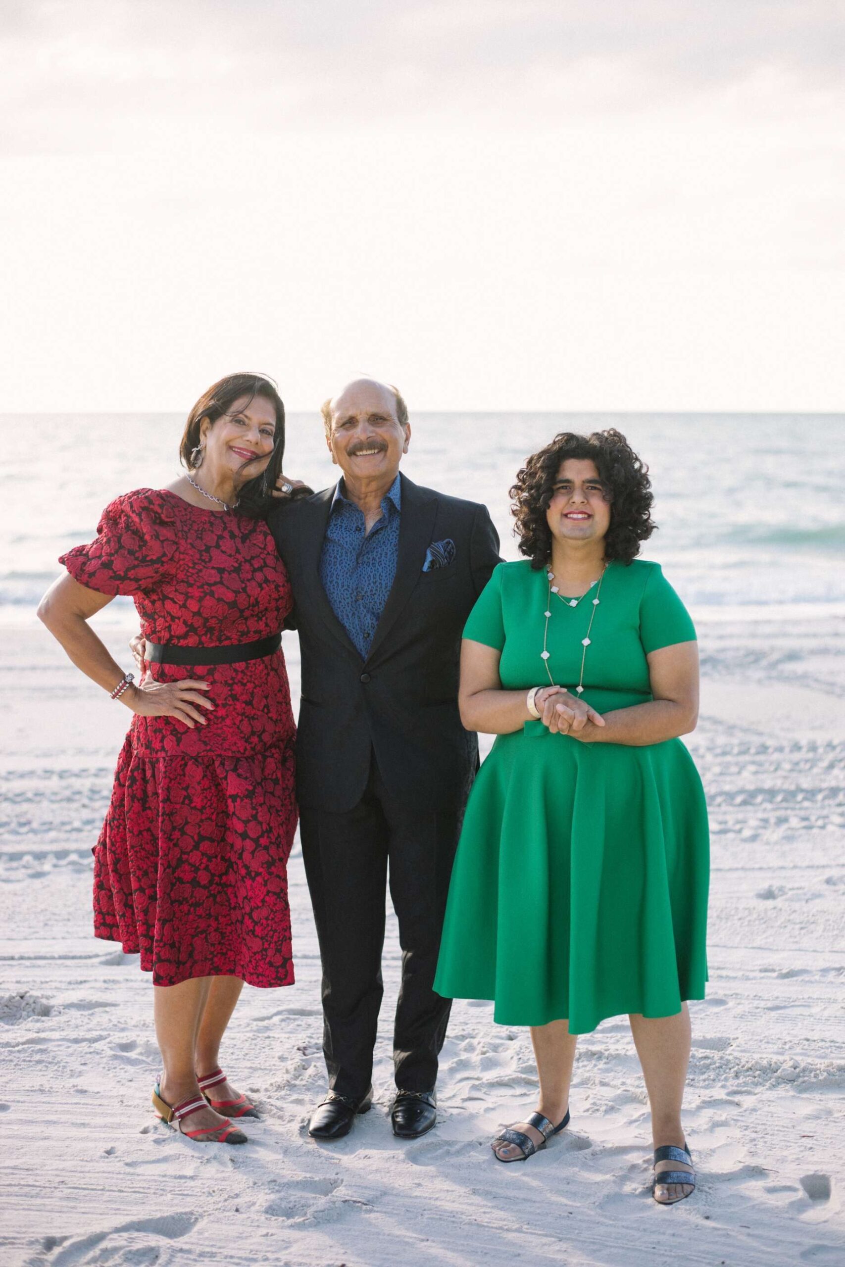 Zoreen and Rafat Ansari with their daughter Sonya (green dress).