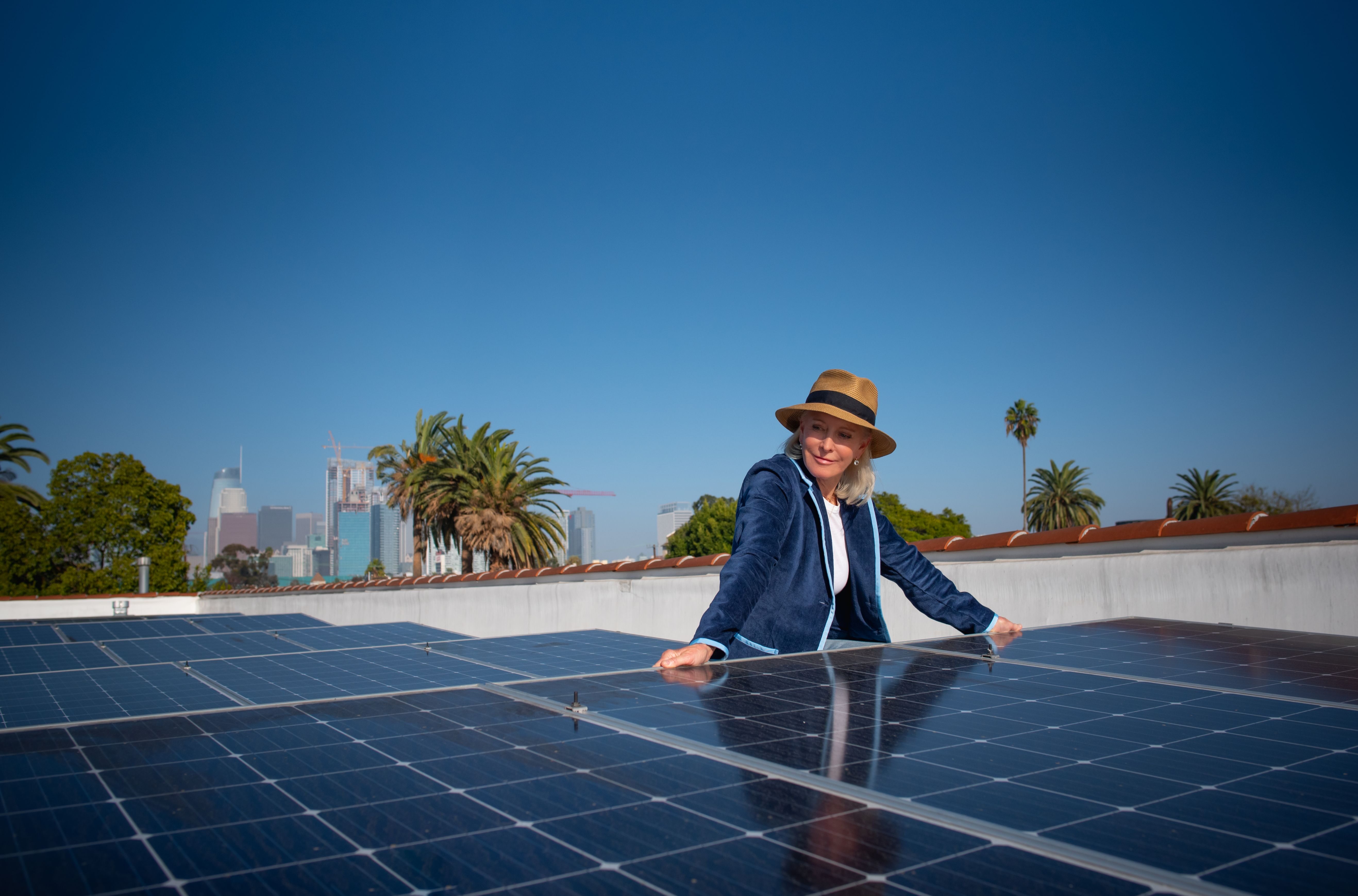 Wendy Schmidt visits a community solar installation for low-income housing, which the Schmidt Family Foundation funded in 2017.