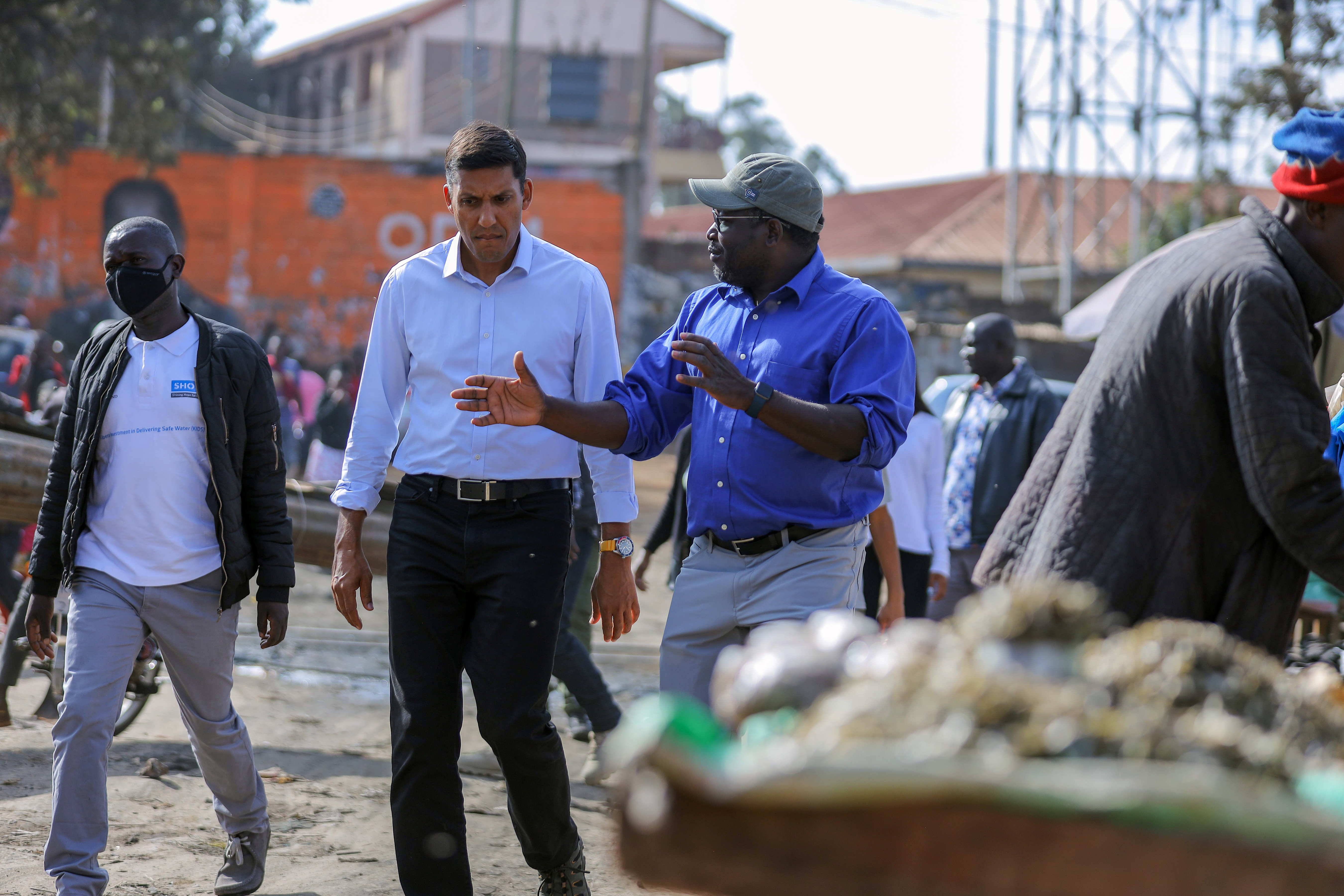 Nairobi, Kenya. August 2023. Rockefeller Foundation President Dr. Rajiv J. Shah speaks with Kenney Odede, founder of Shining Hope for Communities (SHOFCO), an NGO grantee based in Nairobi’s Kibera slum—the largest in Africa—that aims to advance the dignity and equity of urban slum dwellers across Kenya. 