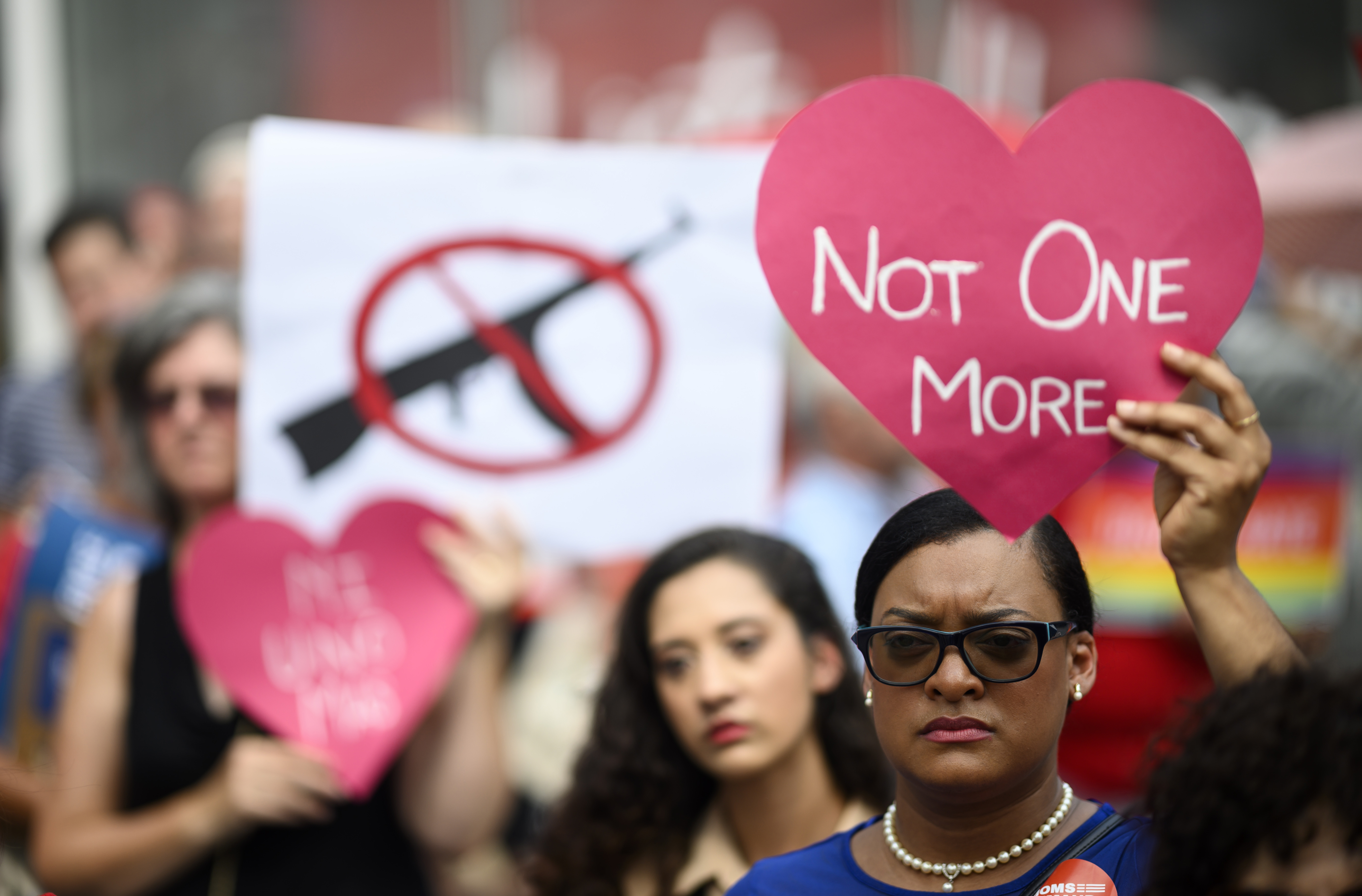 Protestors take part in a rally of Moms against gun violence and calling for Federal Background Checks on  August 18, 2019 in New York City.