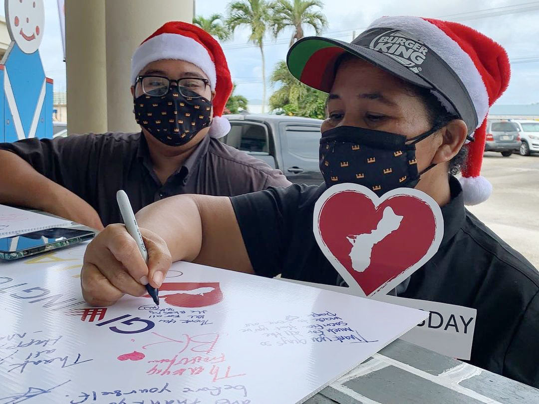People participate in a GivingTuesday toy drive in Guam.