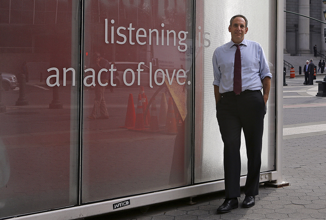 Dave Isay, founder and president of StoryCorps, at its Foley Square booth
in New York. The project has recorded more than 50,000 stories by ordinary
people. 