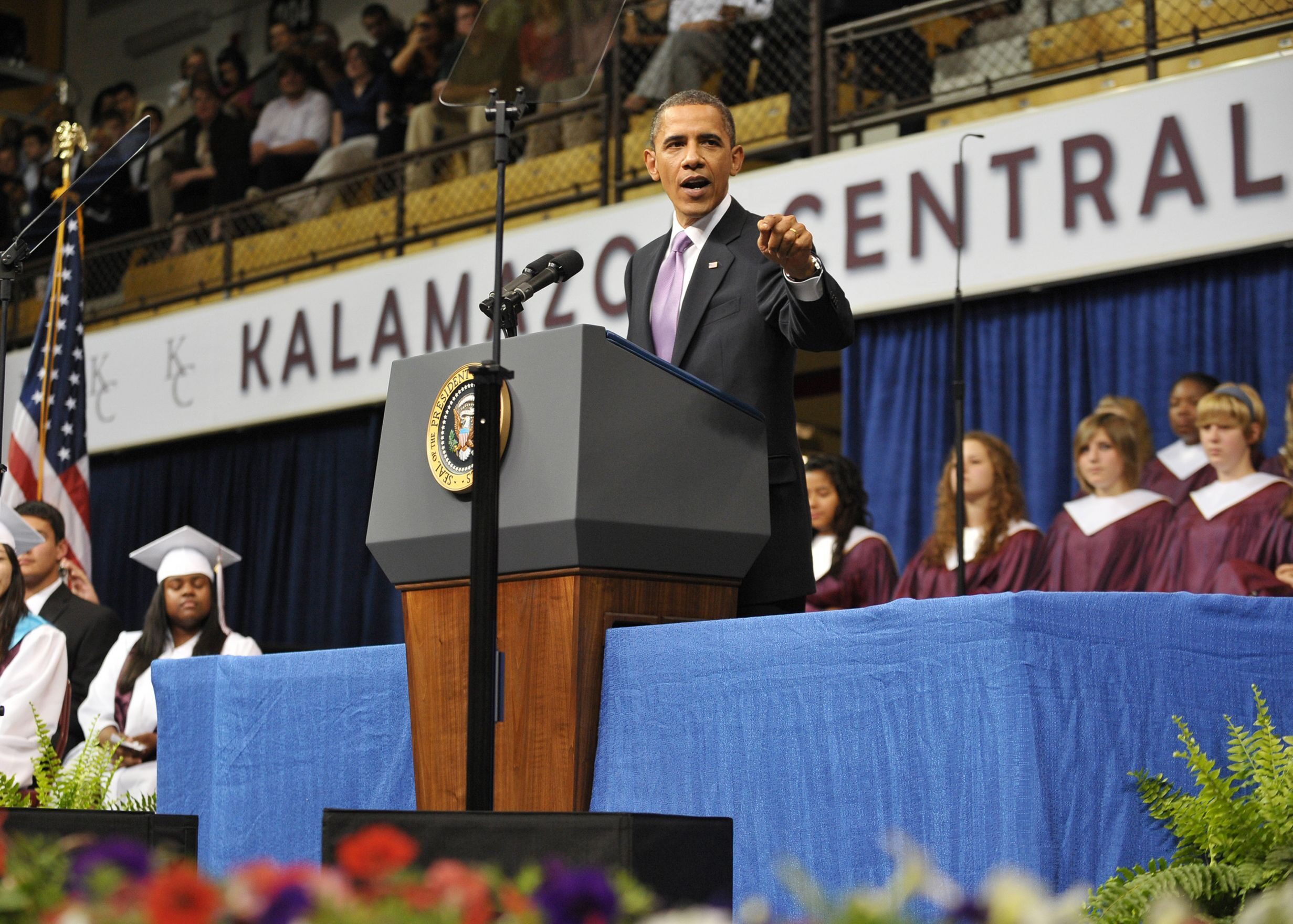 US President Barack Obama speaks as he delivers the commencement speech for Kalamazoo Central High School at Western Michigan University arena in Kalamazoo, Michigan.