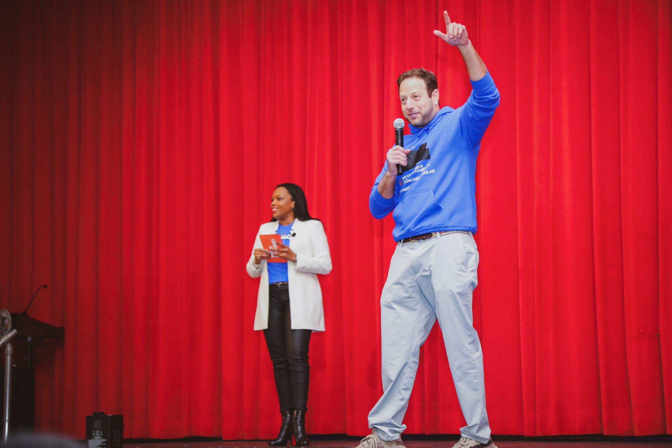 On Feb. 25, 2022, the entire student body (503 students total) at Farragut Career Academy received a surprise visit from Hope Chicago and was told that they and their parents are receiving full, debt-free college scholarships to partner colleges and universities. Here, Pete Kadens, Hope Chicago co-founder shares the stage with Dr. Janice Jackson, CEO of Hope Chicago.