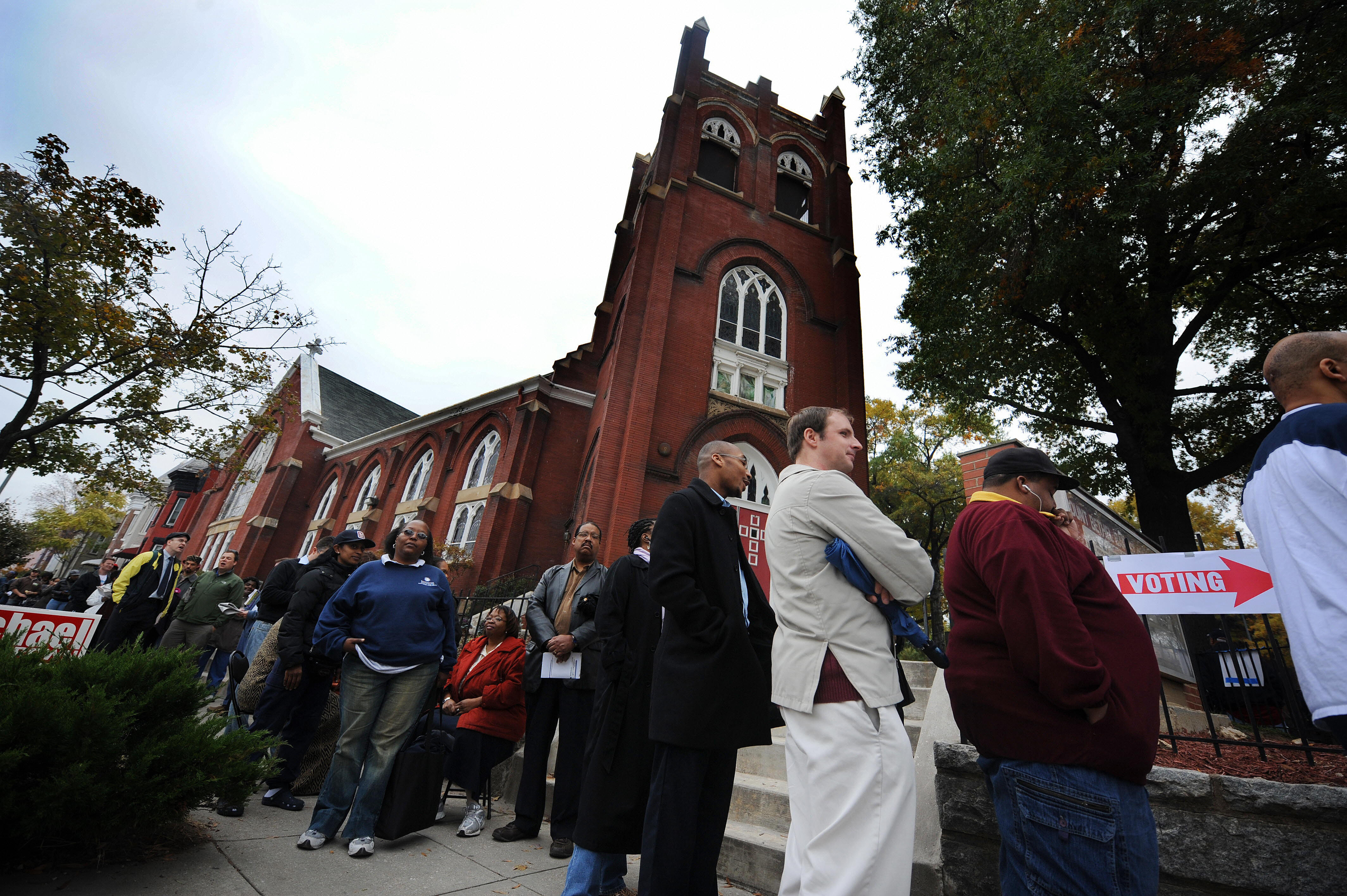 Voters stand in line outside DC voting precinct 135 November 4, 2008 at the Mount Bethel Baptist Church in the NW section of Washington, DC.