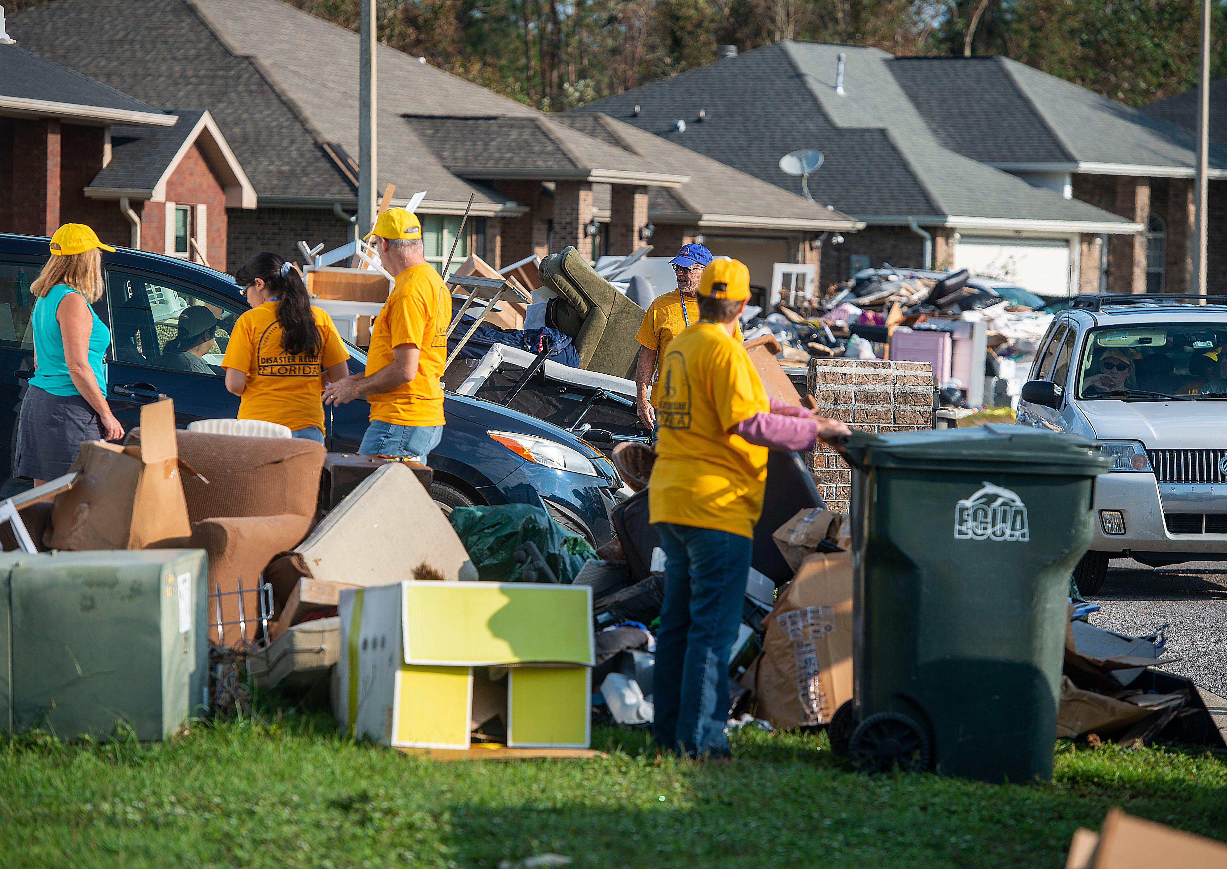 Members of Southern Baptist Convention Disaster Relief Florida help with clean-up in the Bristol Park neighborhood after Hurricane Sally Saturday, September 26, 2020.