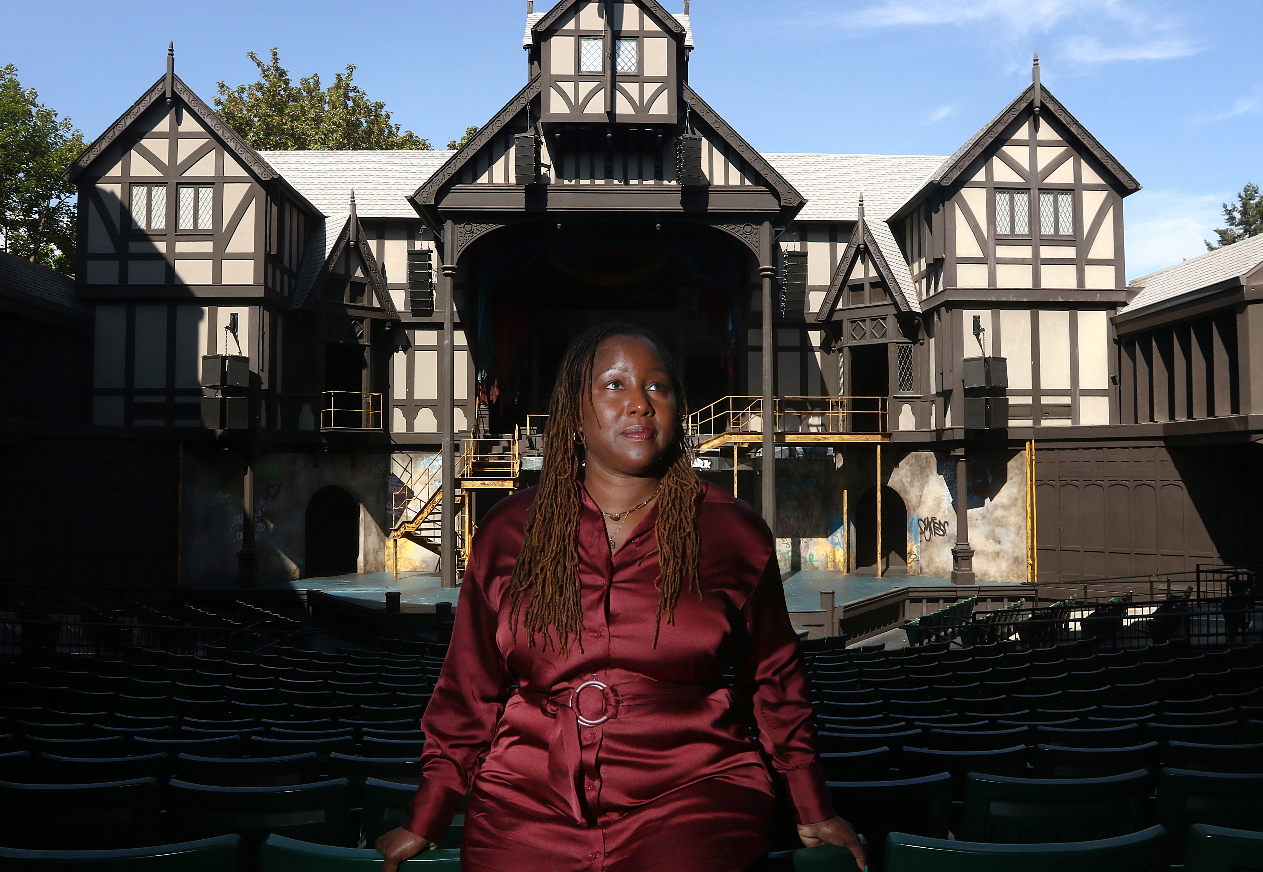 Oregon Shakespeare Festival Artistic Director Nataki Garrett poses for a photograph inside the Allen Elizabethan Theatre in Ashland, Oregon on Sept. 12, 2022. 