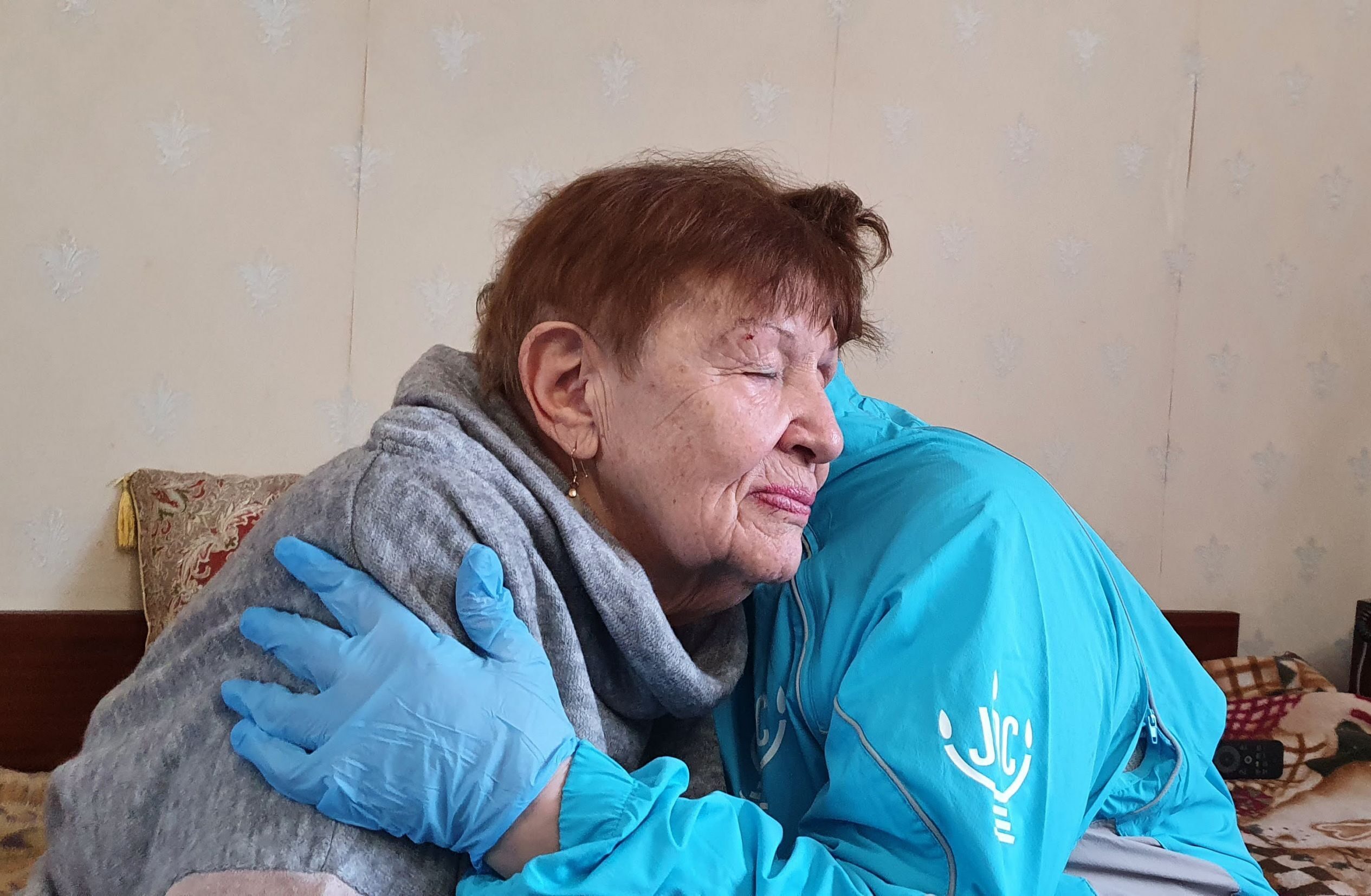 88-year old Natalia Berezhnaya, pictured with her homecare worker in Odesa on Feb. 28, 2022, is one of tens of thousands of needy elderly Jews being care for by the American Jewish Joint Distribution Committee (JDC). As a Holocaust survivor her care is provided by JDC in partnership with the Claims Conference. 