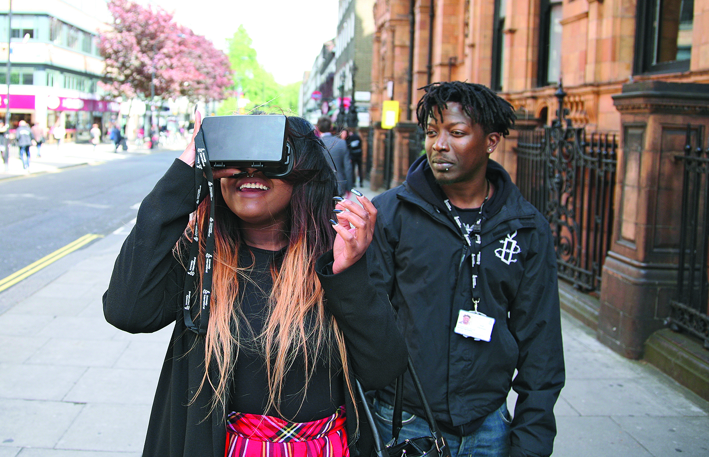 UP CLOSE: Street fundraisers for Amnesty International UK show potential donors 3-D photographs of the devastation caused by barrel bombing in Syria.