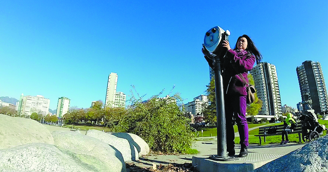 SURPRISE!: The Dogwood Initiative hid a virtual-reality headset in sightseeing binoculars to show unsuspecting visitors what Vancouver’s English Bay might look like after an oil-tank disaster. 