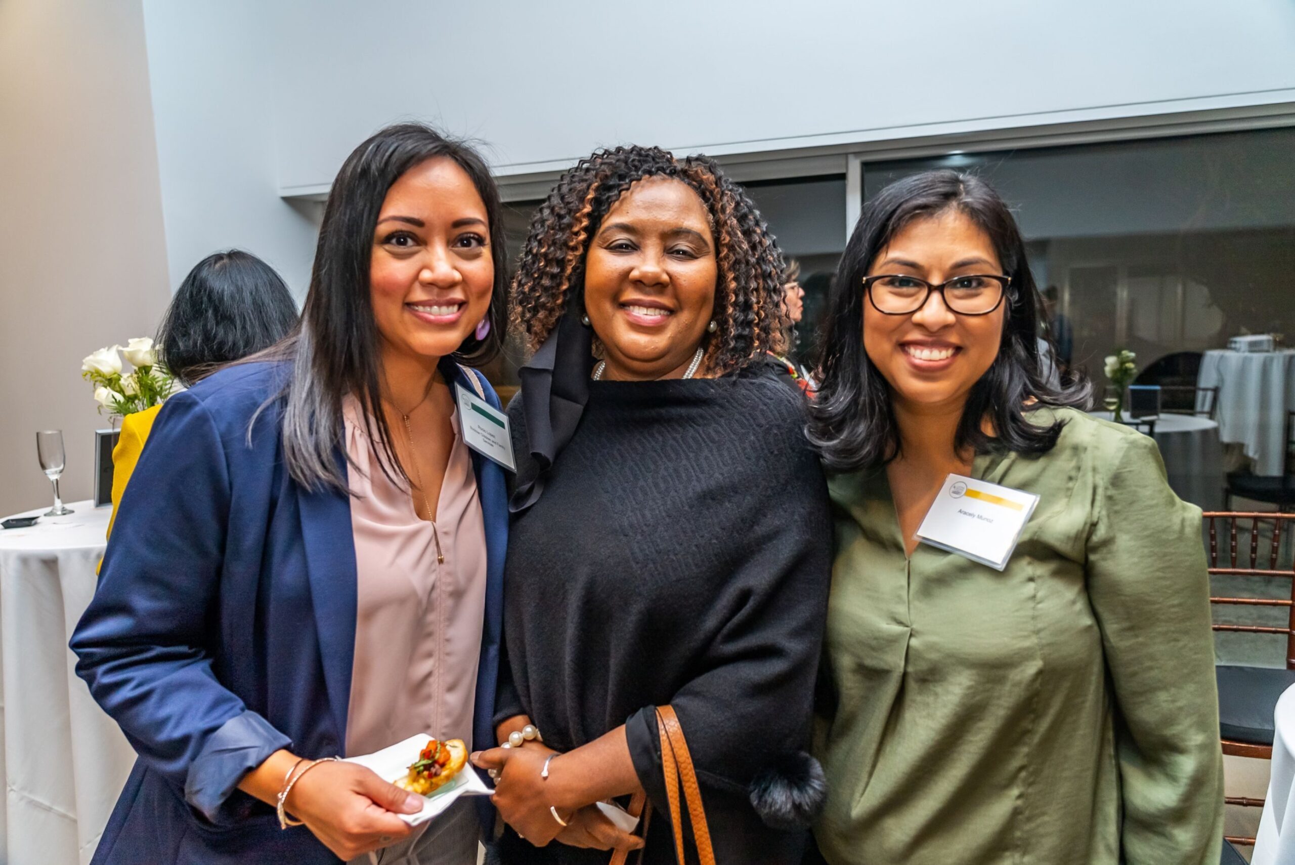 Latina Giving Circle grantees Rocío López (far left) and Cheryl Williams with the author Aracely Muñoz.