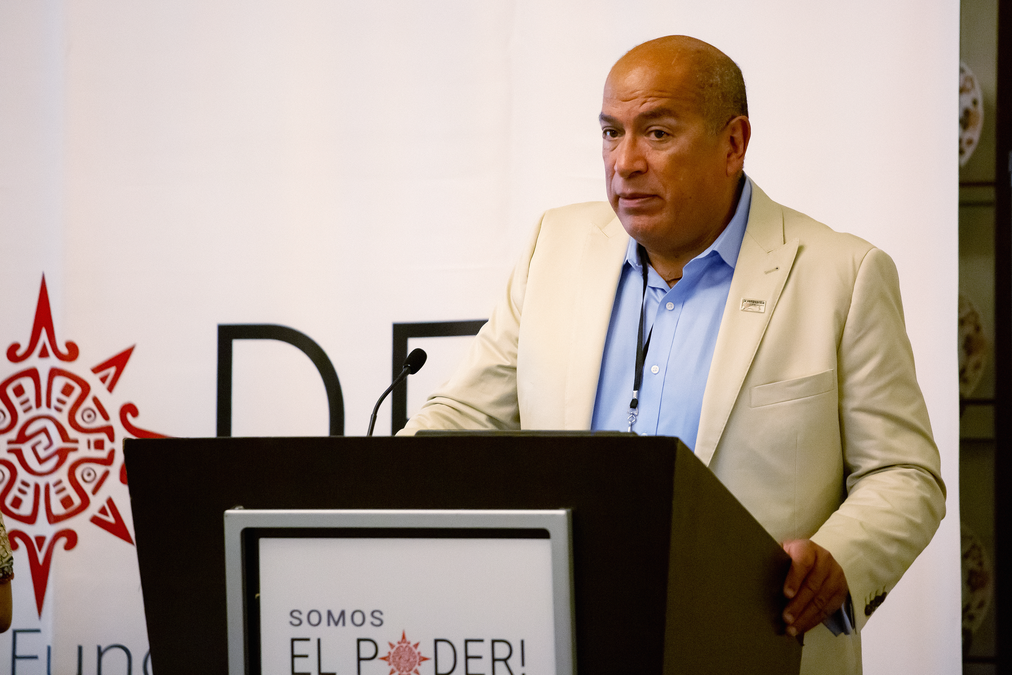 Armando Zumaya, founder of Somos El Poder, speaks at the organization’s Fundraising Con Ganas conference in Pasadena, Calif., on April 6, 2023.