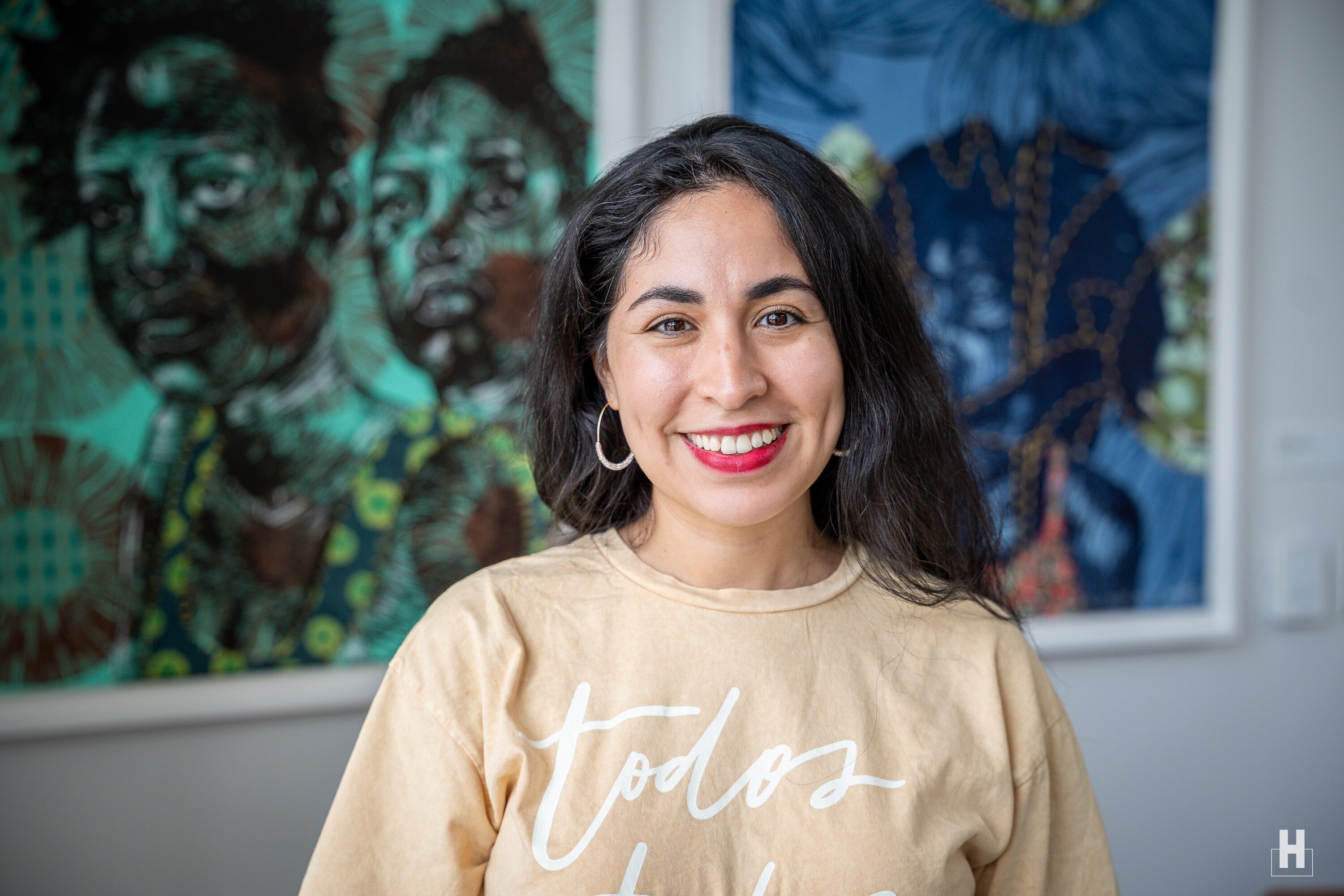 Dayana Iza, State Director for Mi Familia En Acción in Texas, poses for a portrait in Houston, Texas on May 29, 2025. Iza was a participating grantee for the oral reporting pilot program using AI. 